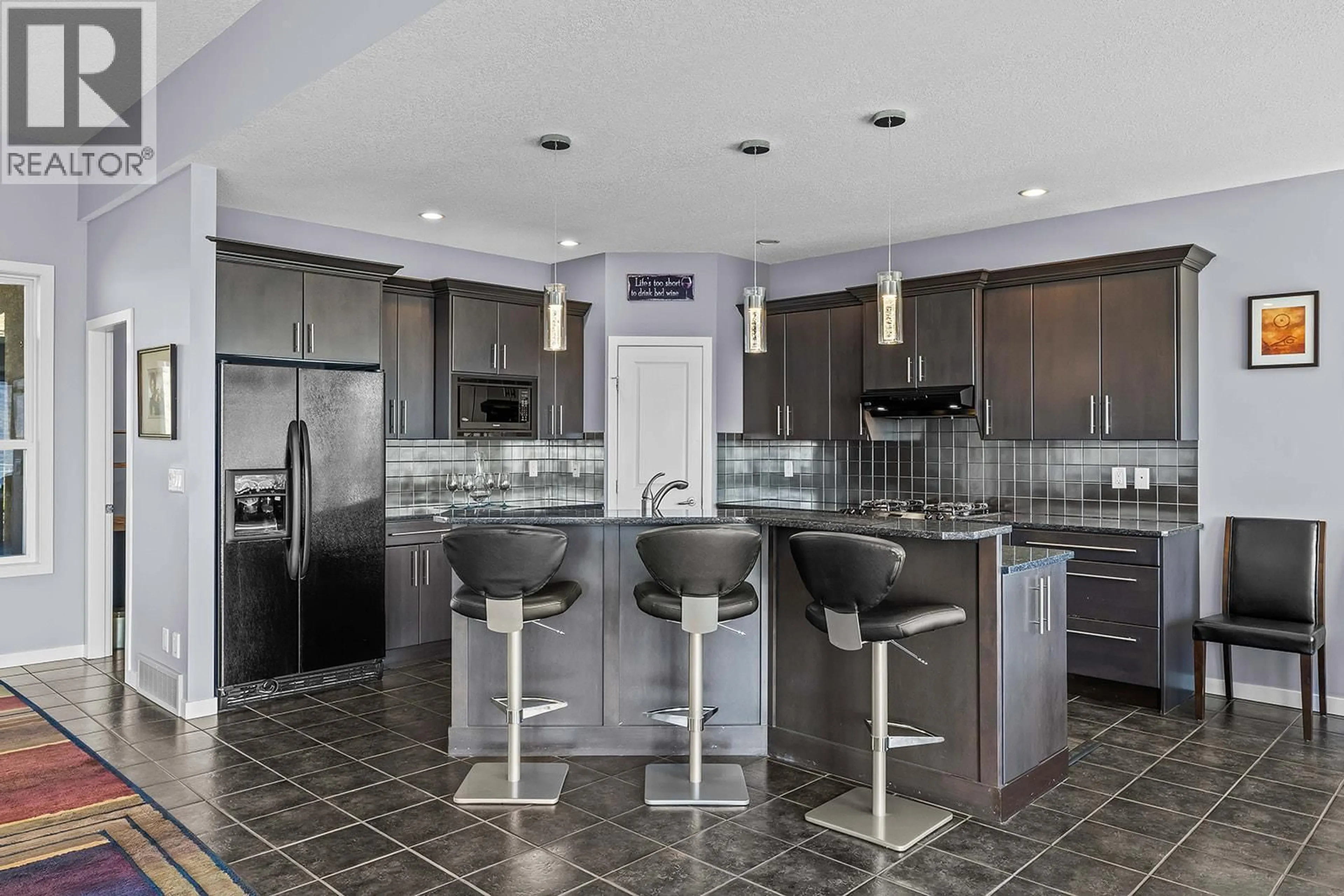 Contemporary kitchen, ceramic/tile floor for 6498 SHERBURN ROAD, Peachland British Columbia V0H1X7