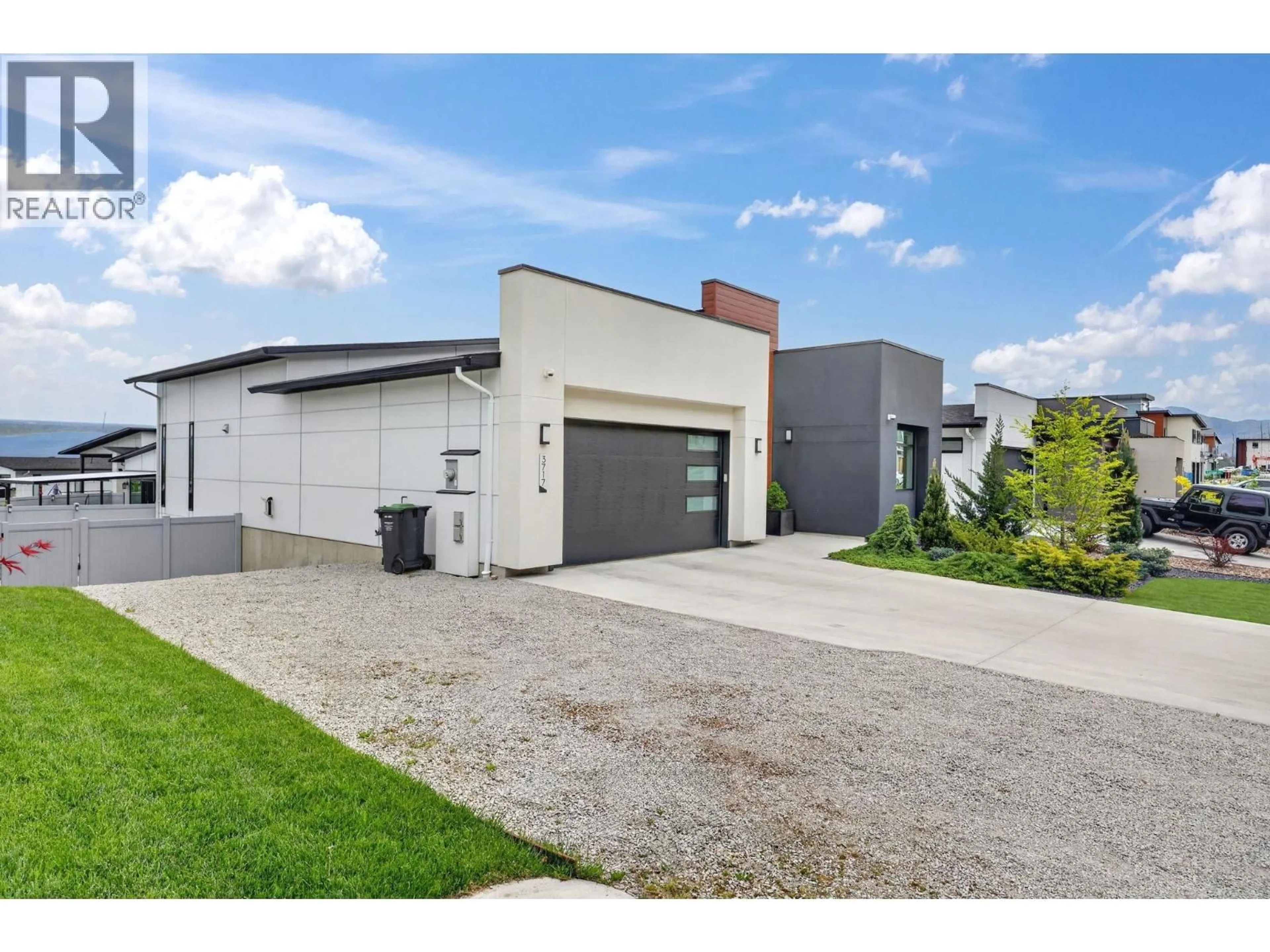 A pic from outside/outdoor area/front of a property/back of a property/a pic from drone, street for 3717 ASTORIA DRIVE, West Kelowna British Columbia V4T0B1