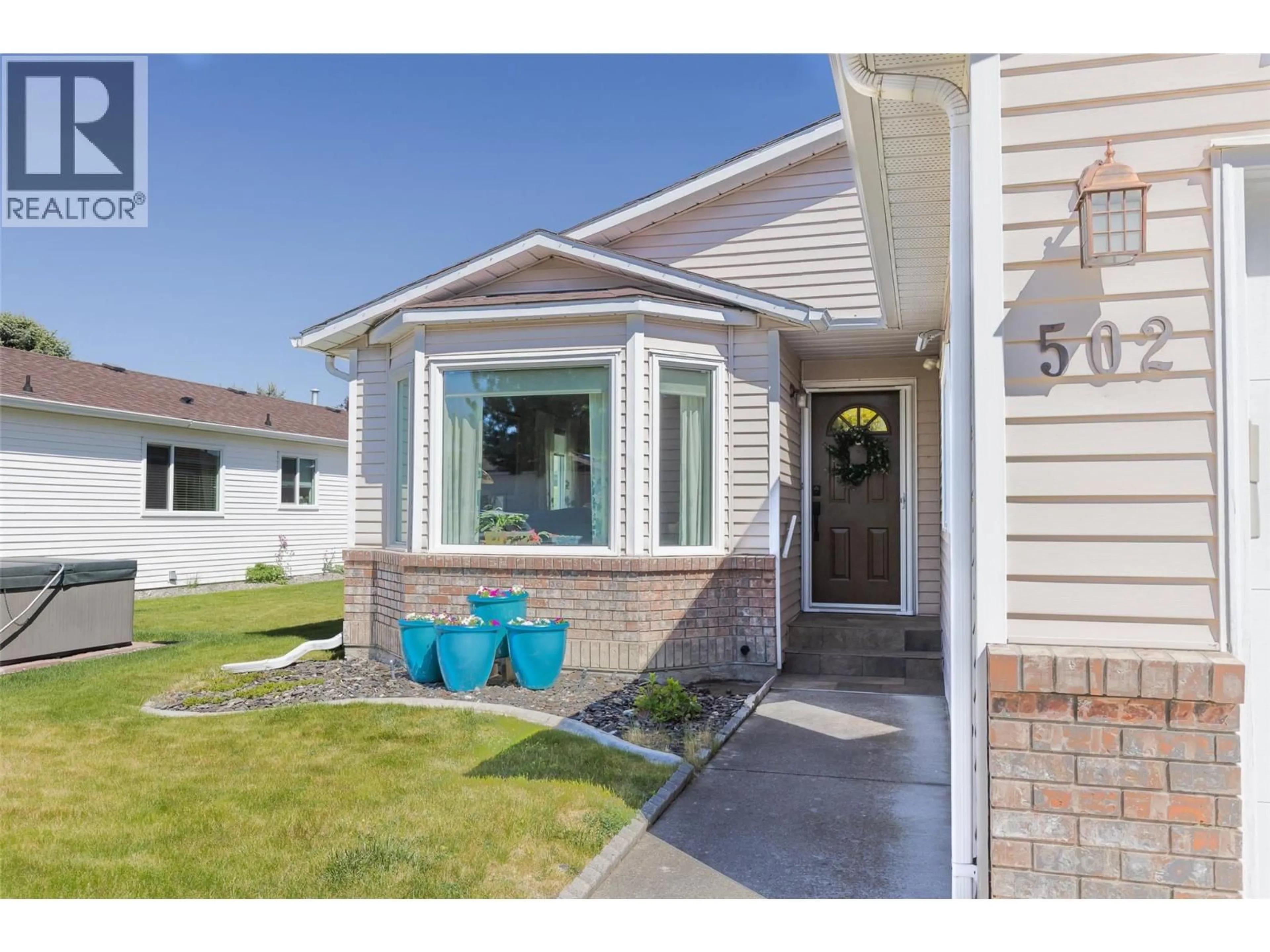 Home with vinyl exterior material, street for 502 - 1255 RAYMER AVENUE, Kelowna British Columbia V1W3S3