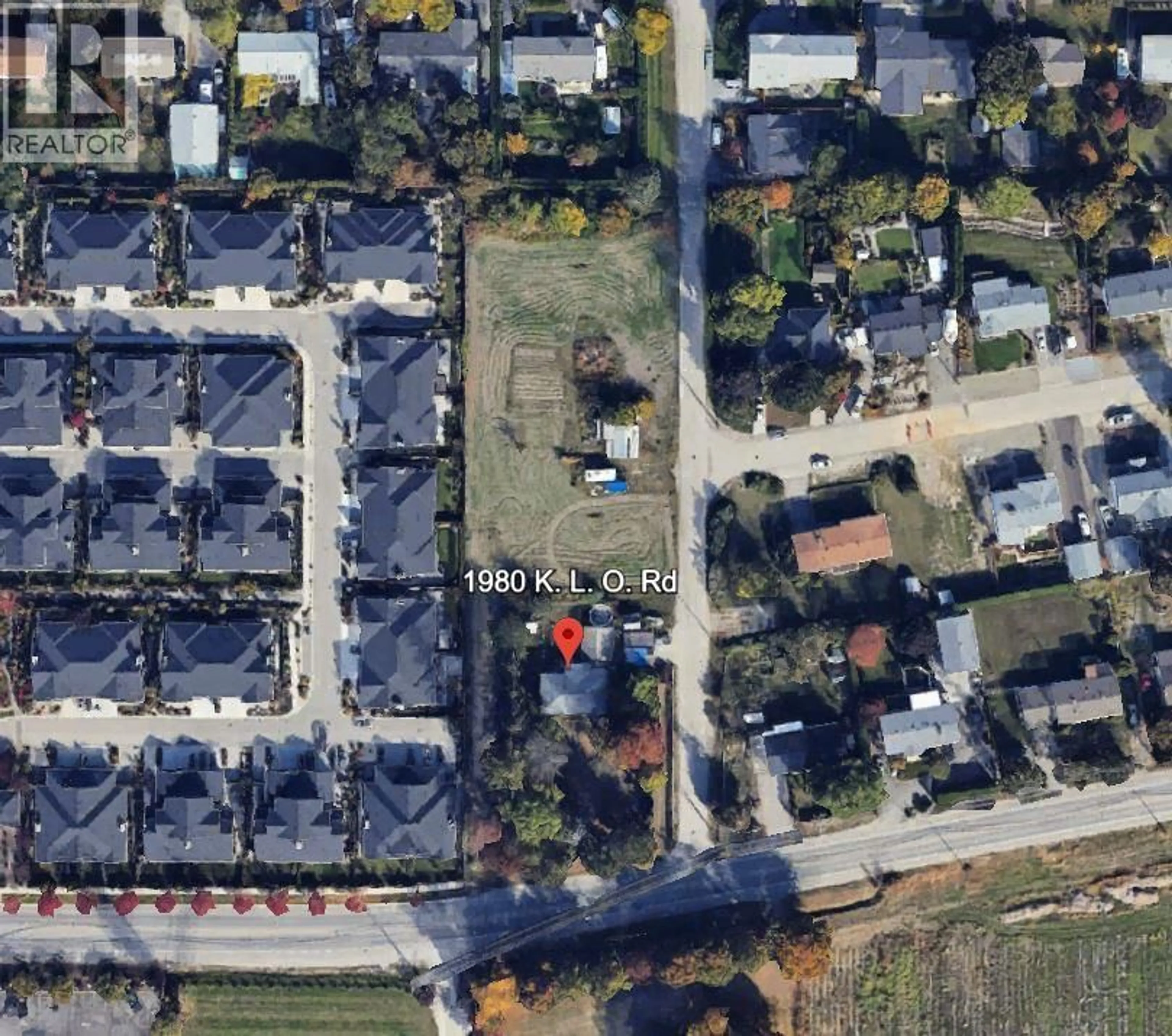A pic from outside/outdoor area/front of a property/back of a property/a pic from drone, street for 1980 KLO ROAD, Kelowna British Columbia V1W2H6