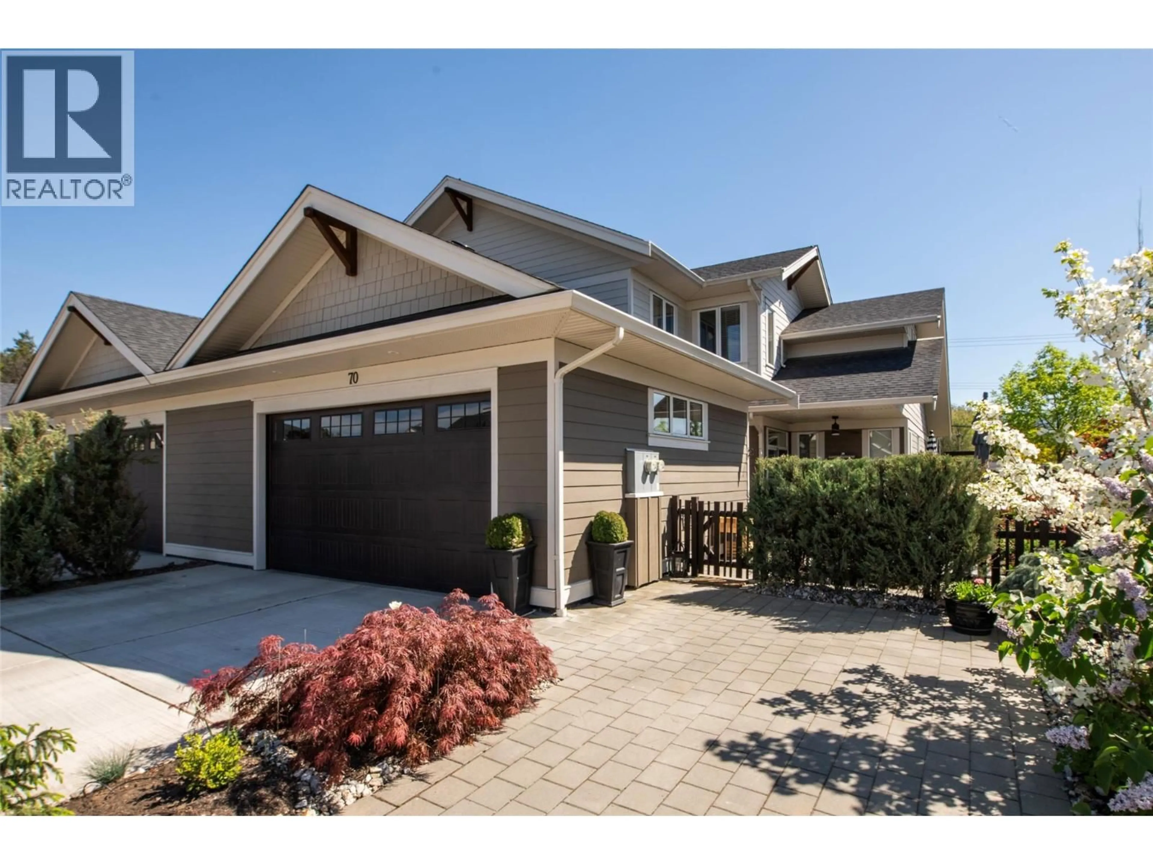Home with vinyl exterior material, street for 70 - 1960 KLO ROAD, Kelowna British Columbia V1W5L2