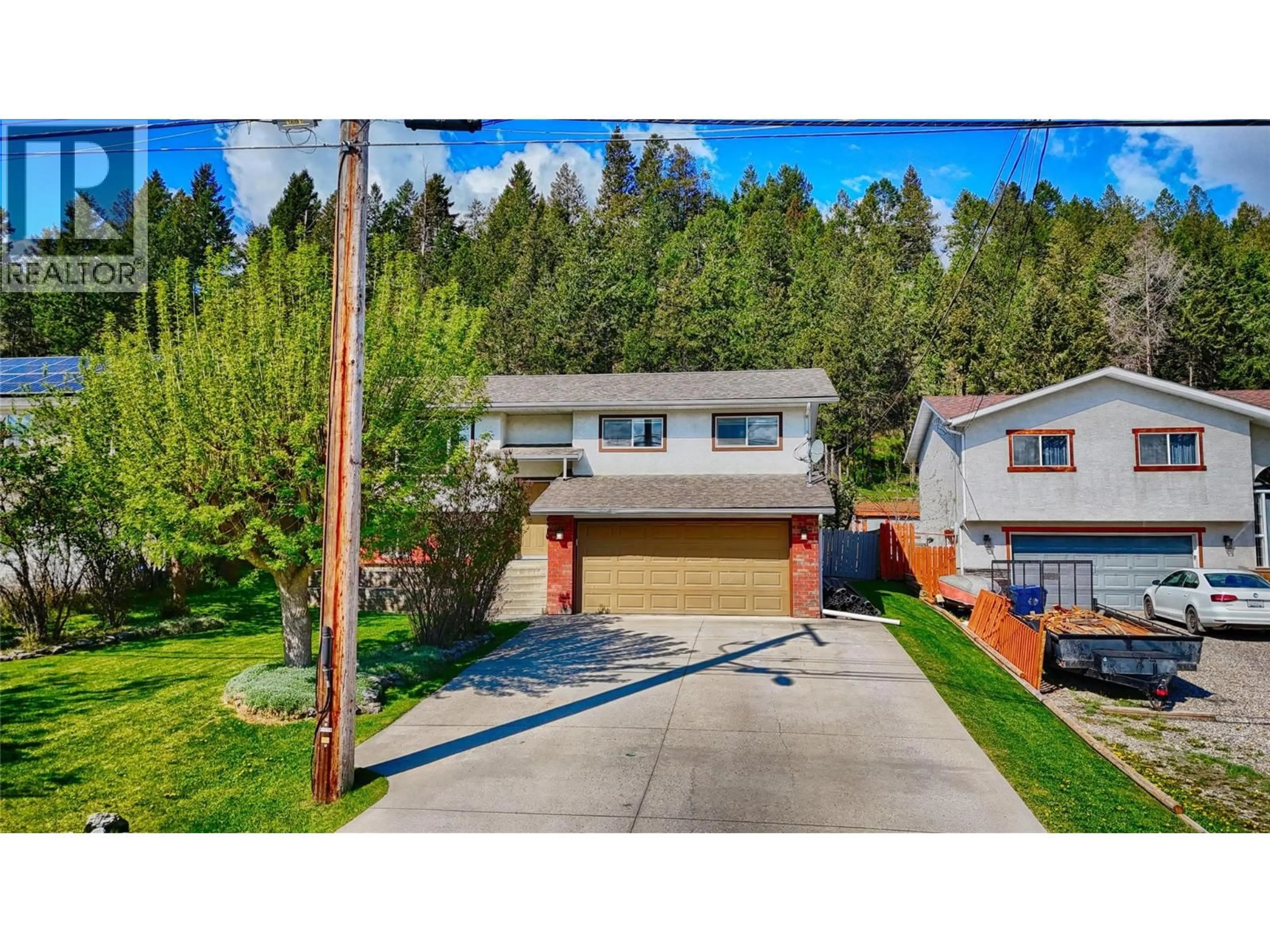 A pic from outside/outdoor area/front of a property/back of a property/a pic from drone, street for 1710 15TH AVENUE, Invermere British Columbia V0A1K4