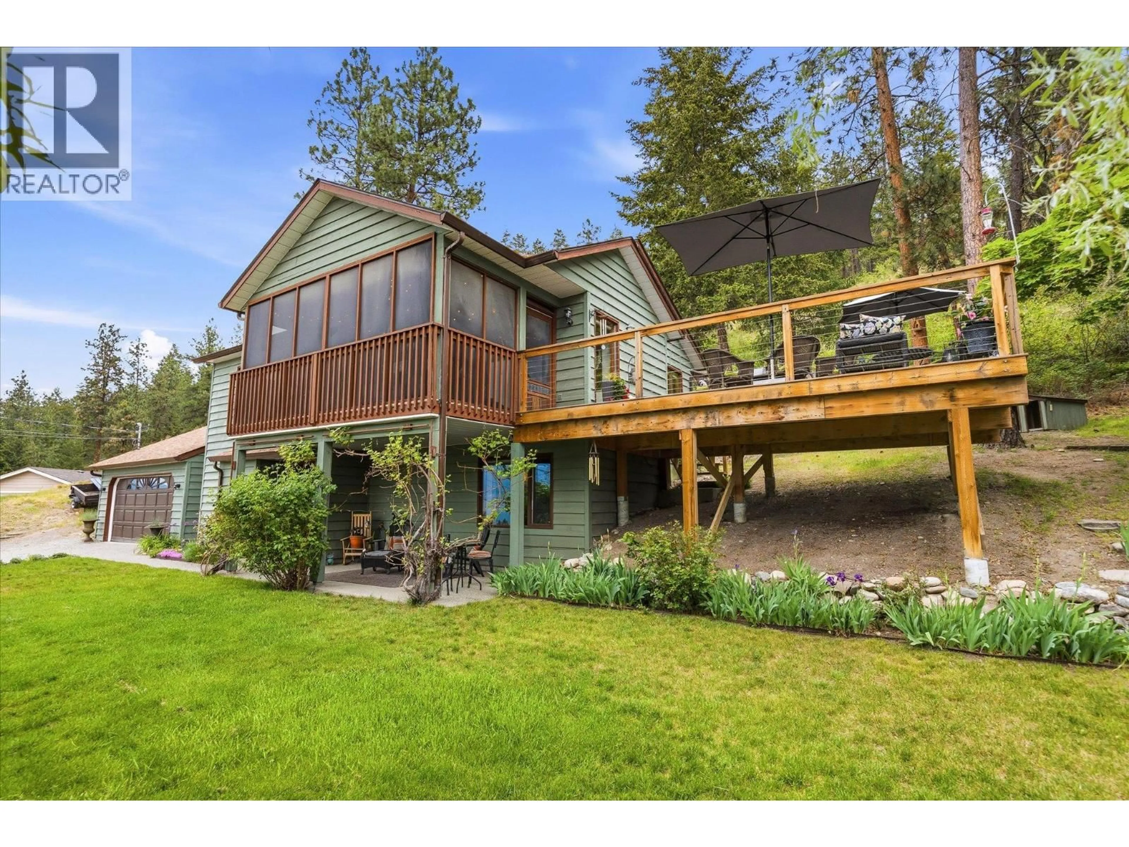 A pic from outside/outdoor area/front of a property/back of a property/a pic from drone, water/lake/river/ocean view for 16455 COMMONAGE ROAD, Lake Country British Columbia V4V1B3