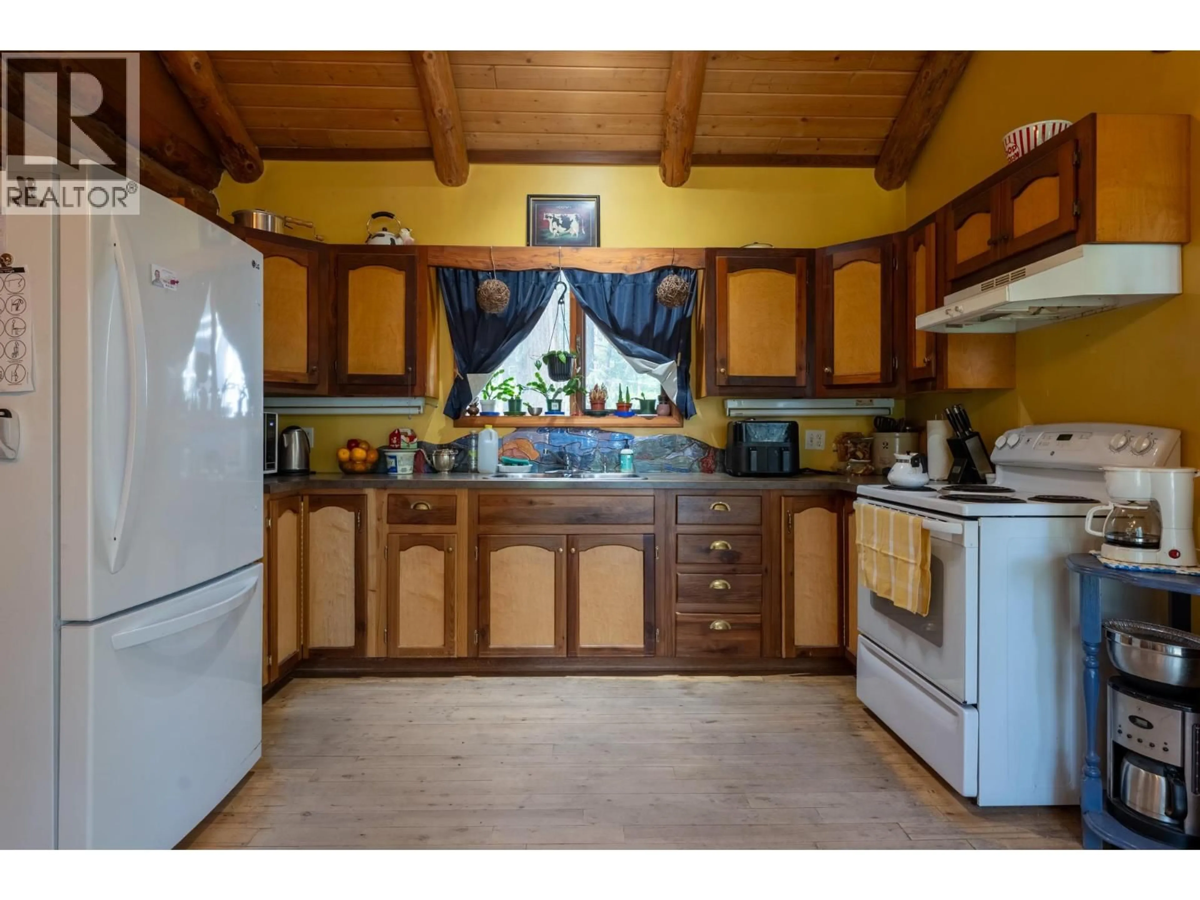 Standard kitchen, ceramic/tile floor for 9635 KEITHLEY ROAD, Vernon British Columbia V1H2E6