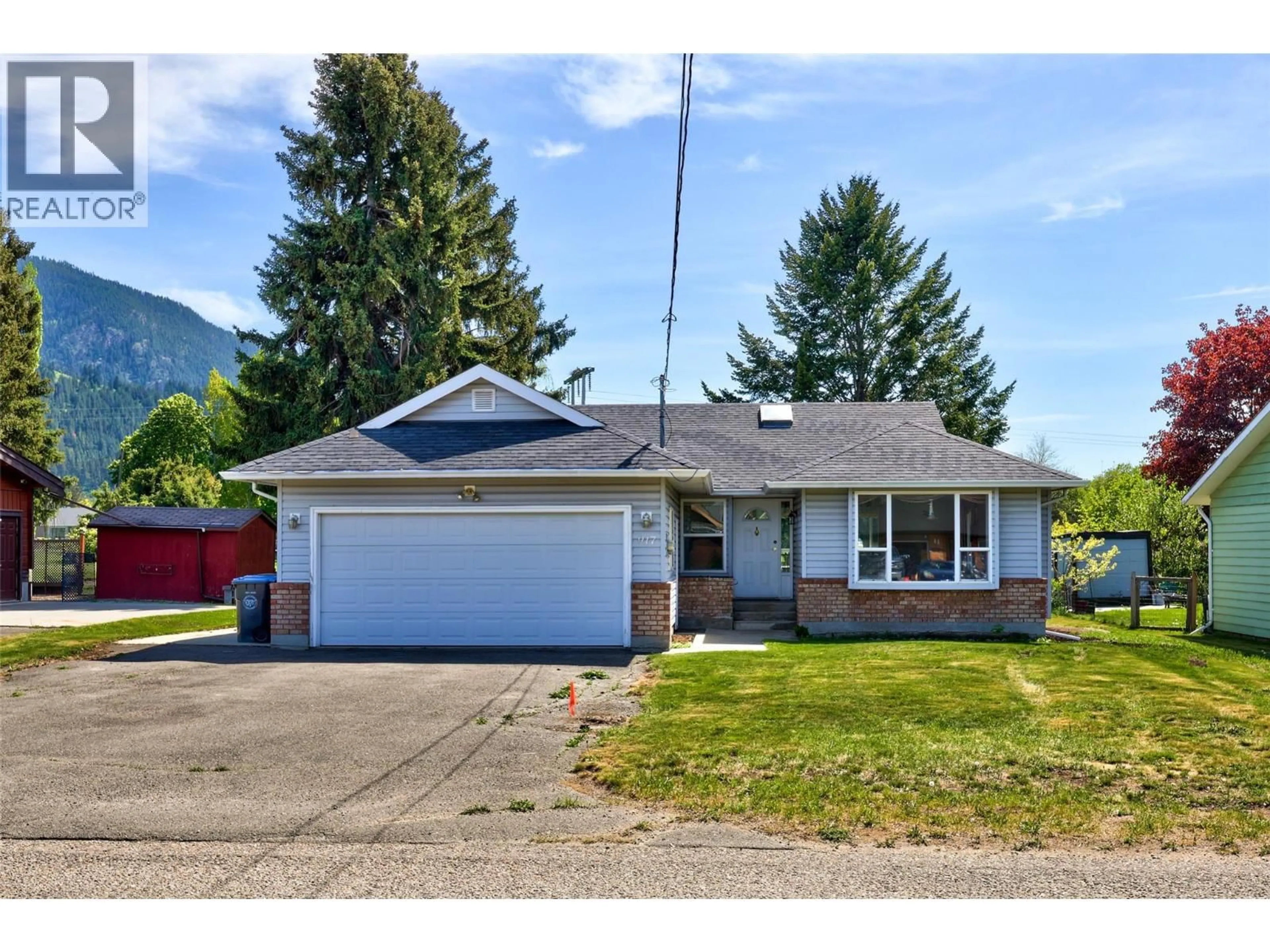 Home with vinyl exterior material, street for 917 HYSOP ROAD, Chase British Columbia V0E1M0