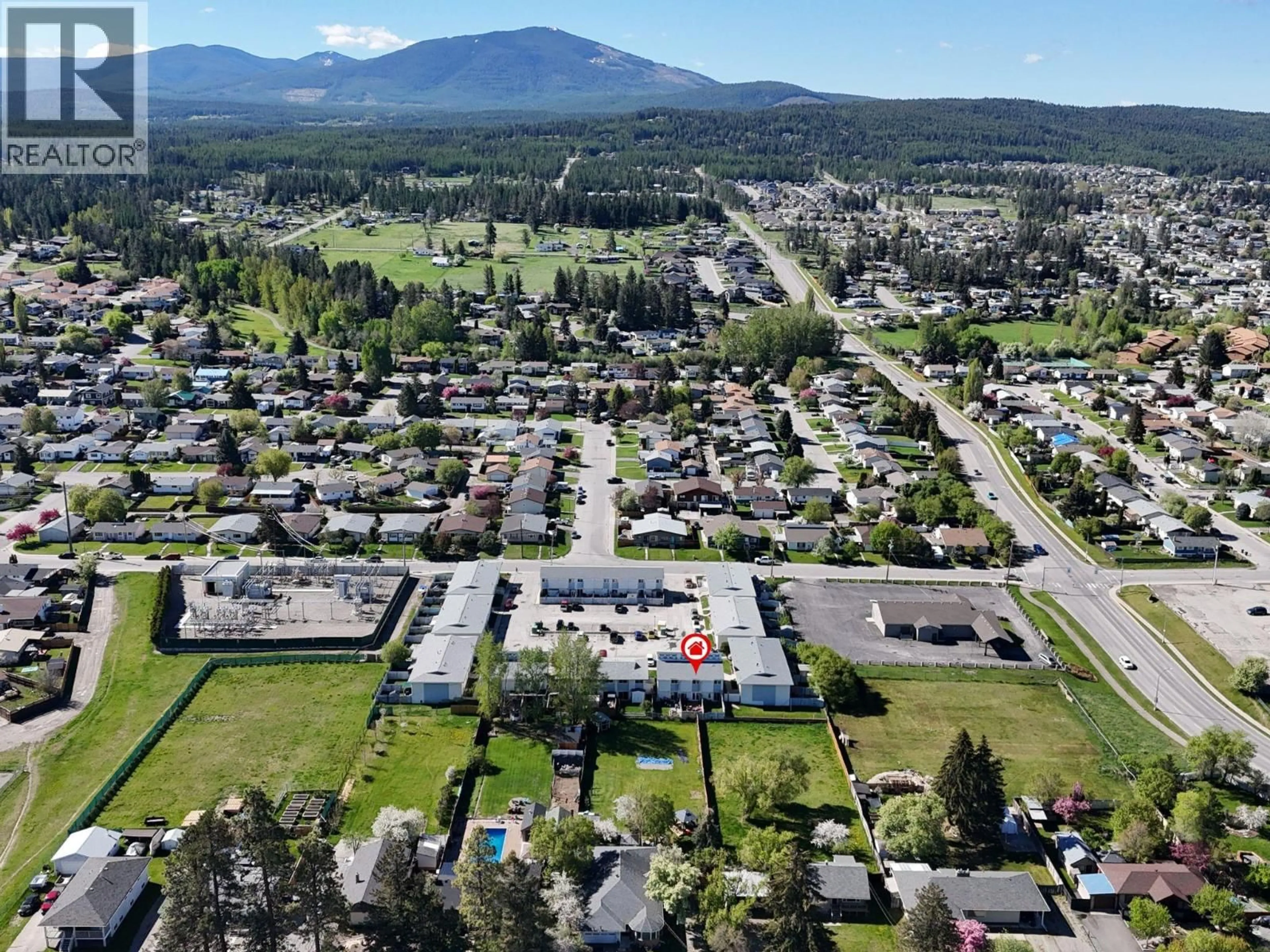 A pic from outside/outdoor area/front of a property/back of a property/a pic from drone, mountain view for 2326 3RD STREET SOUTH, Cranbrook British Columbia V1C4X5