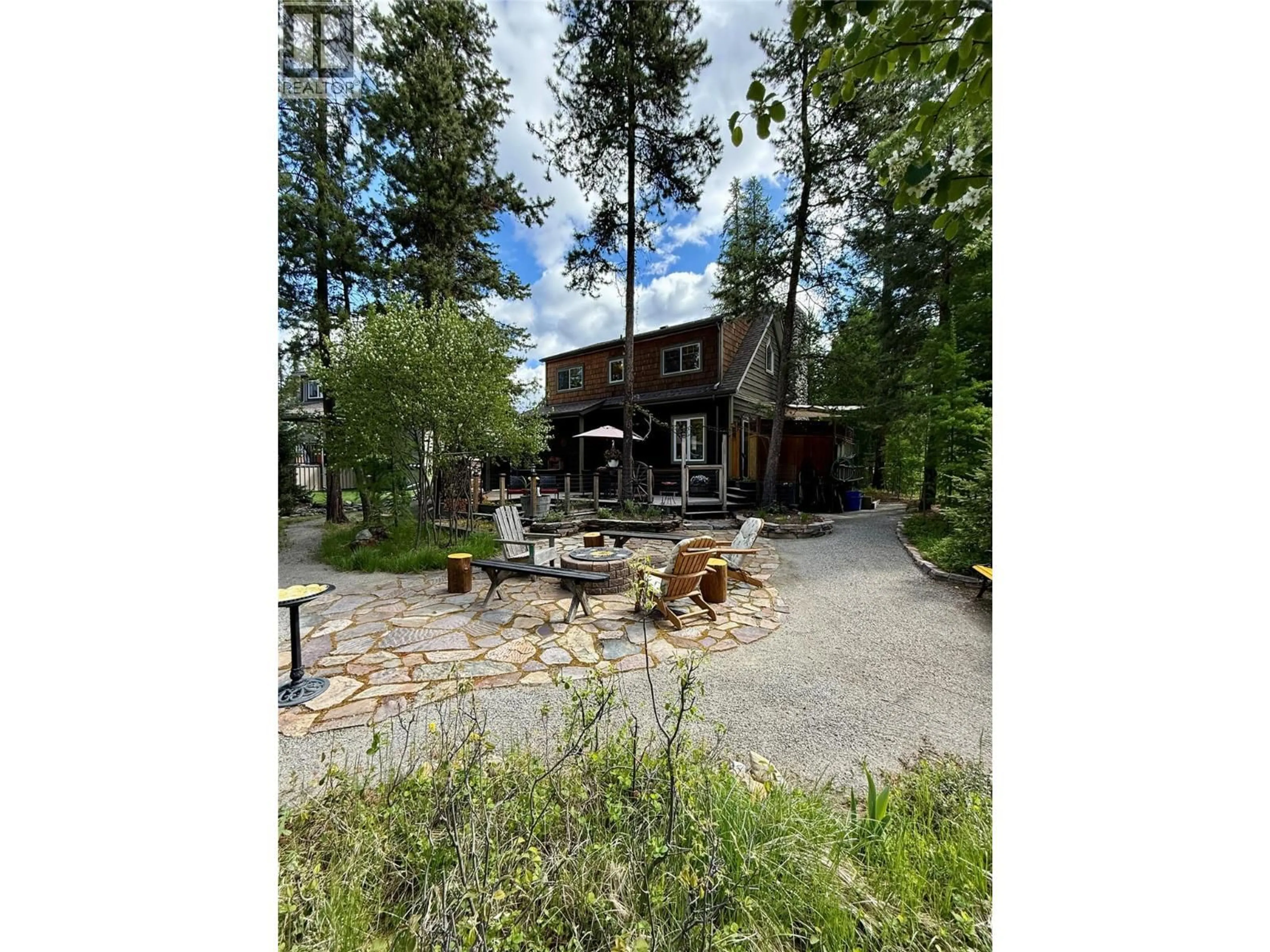 A pic from outside/outdoor area/front of a property/back of a property/a pic from drone, forest/trees view for 205 FOREST CROWNE CLOSE, Kimberley British Columbia V1A3N2