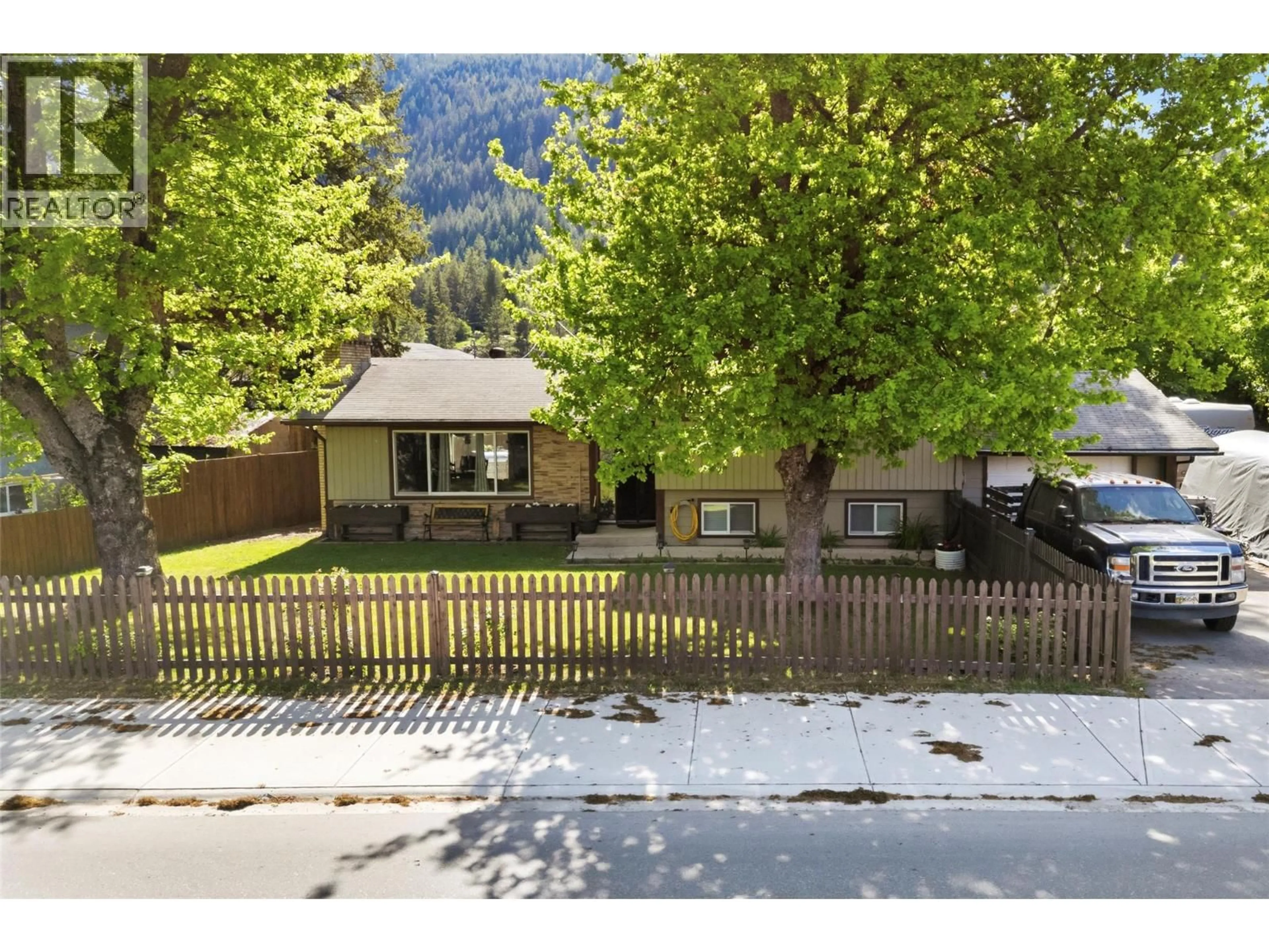 A pic from outside/outdoor area/front of a property/back of a property/a pic from drone, mountain view for 606 RIVERSIDE AVENUE, Sicamous British Columbia V0E2V0