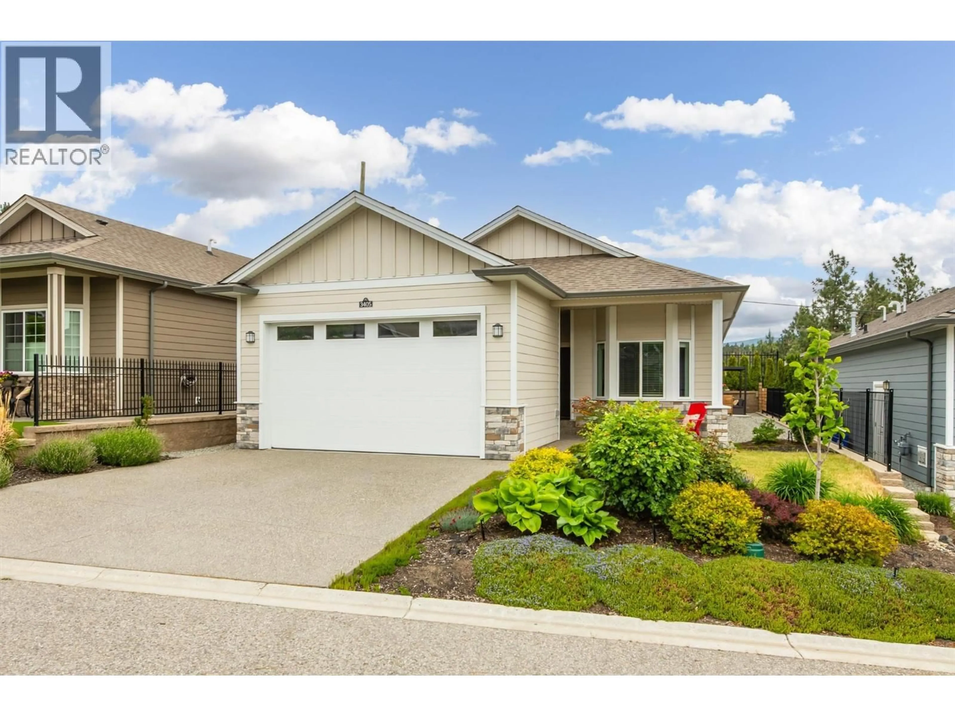Home with vinyl exterior material, street for 3405 IRONWOOD DRIVE, Westbank British Columbia V4T0A9