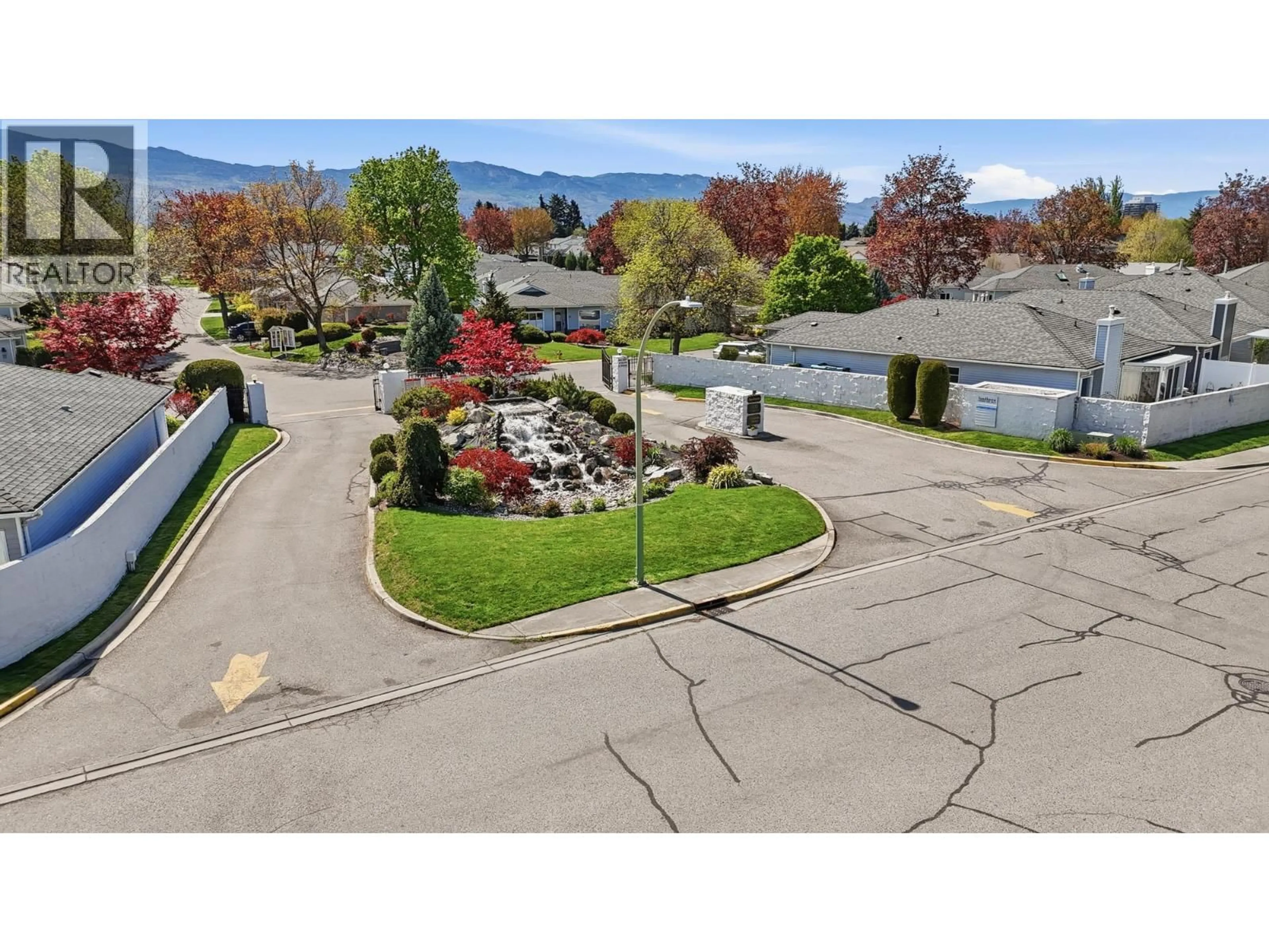 A pic from outside/outdoor area/front of a property/back of a property/a pic from drone, mountain view for 14 - 1101 CAMERON AVENUE, Kelowna British Columbia V1Y8V2