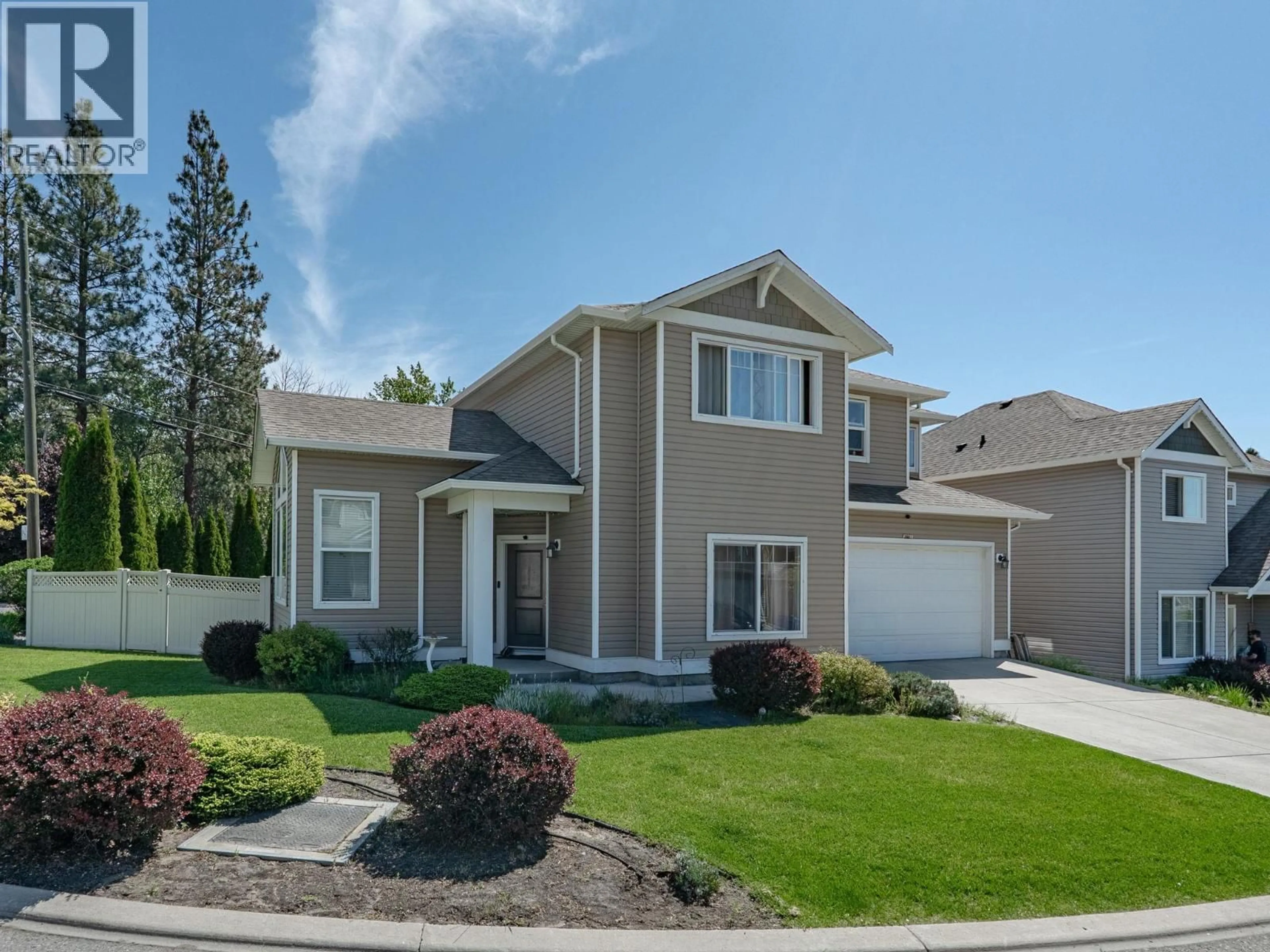 Home with vinyl exterior material, street for 2001 ELKRIDGE DRIVE, West Kelowna British Columbia V4T3J8