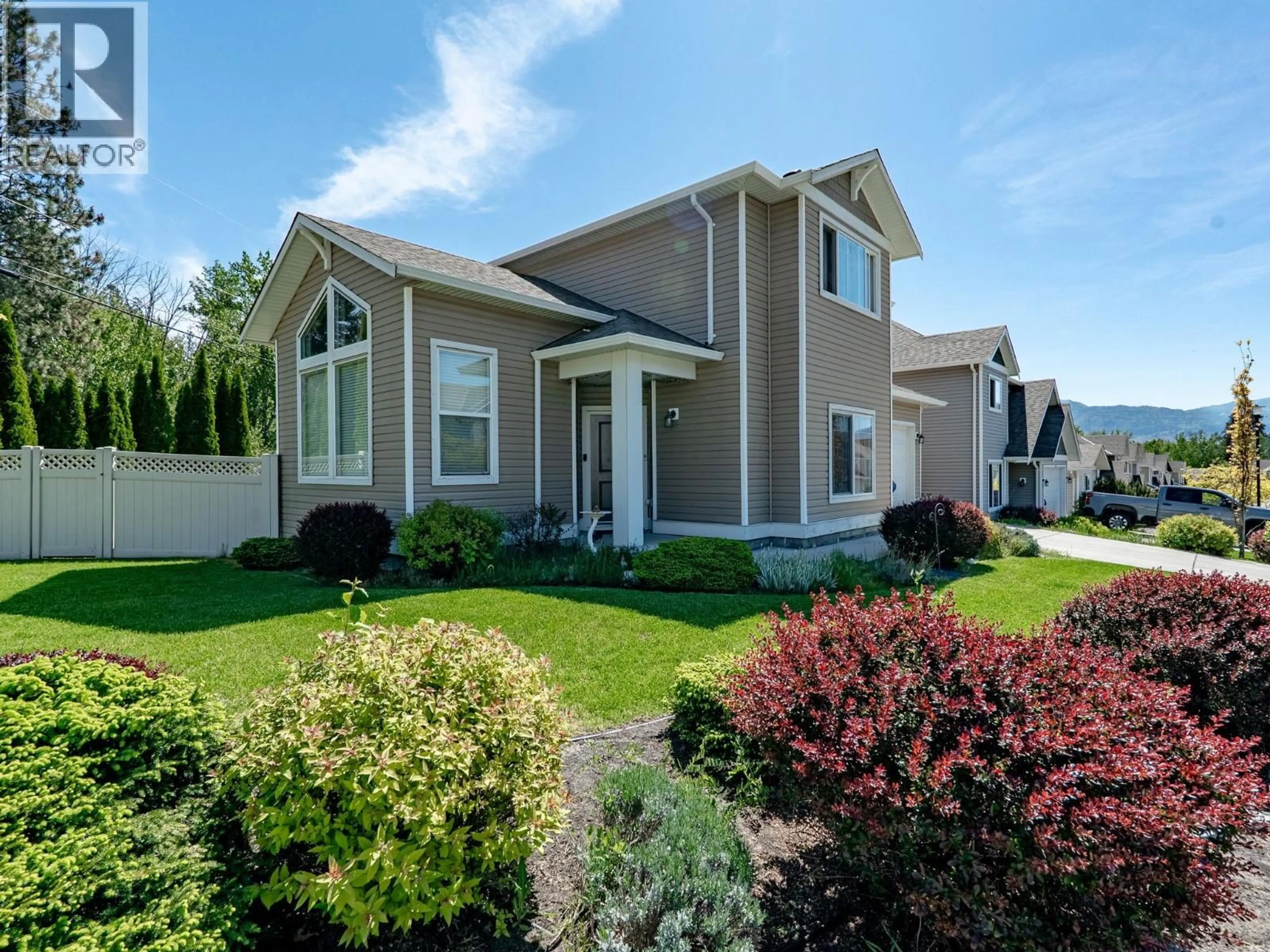 Home with vinyl exterior material, street for 2001 ELKRIDGE DRIVE, West Kelowna British Columbia V4T3J8
