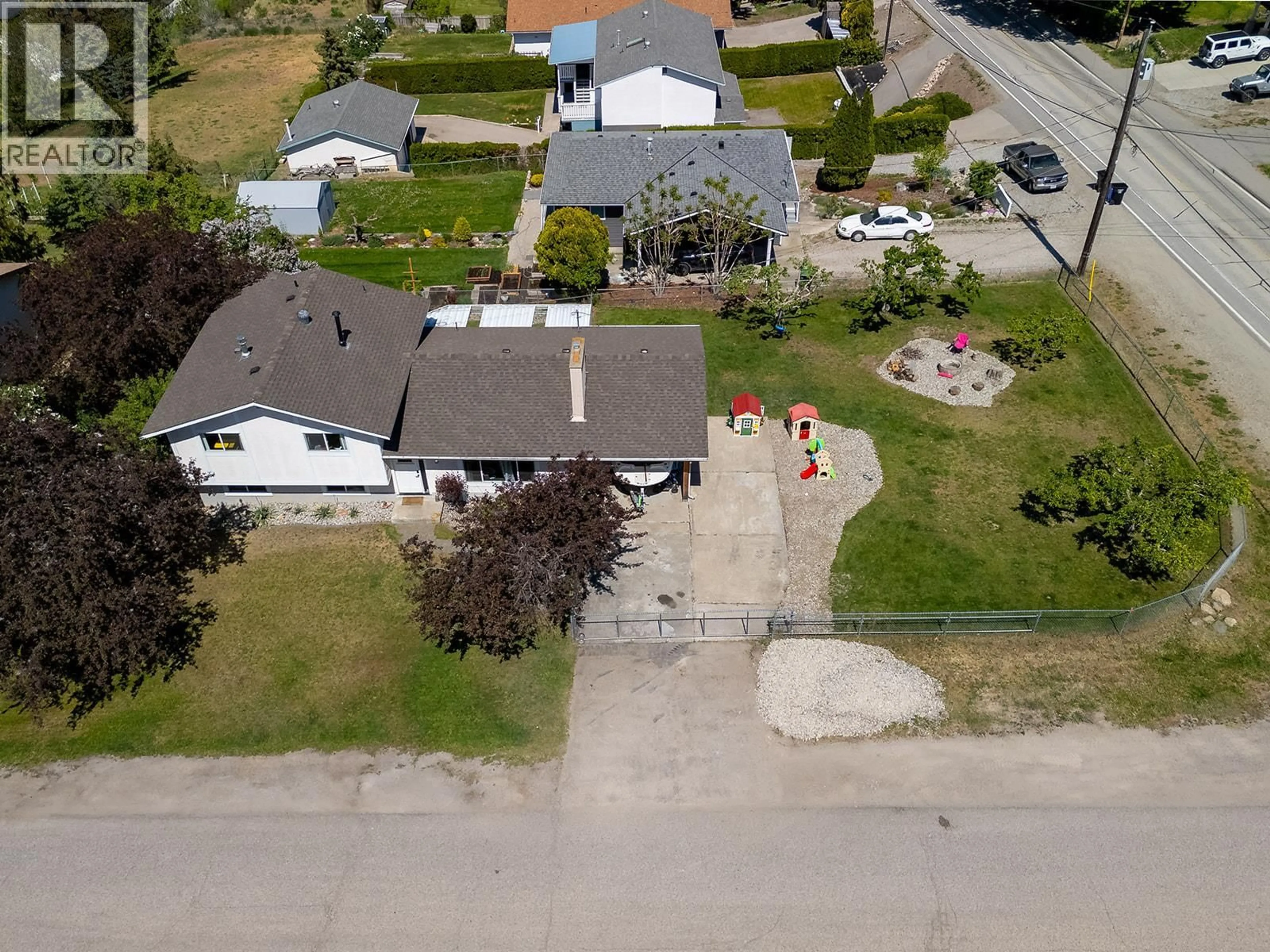 A pic from outside/outdoor area/front of a property/back of a property/a pic from drone, street for 10694 BONNIE DRIVE, Lake Country British Columbia V4V1W1