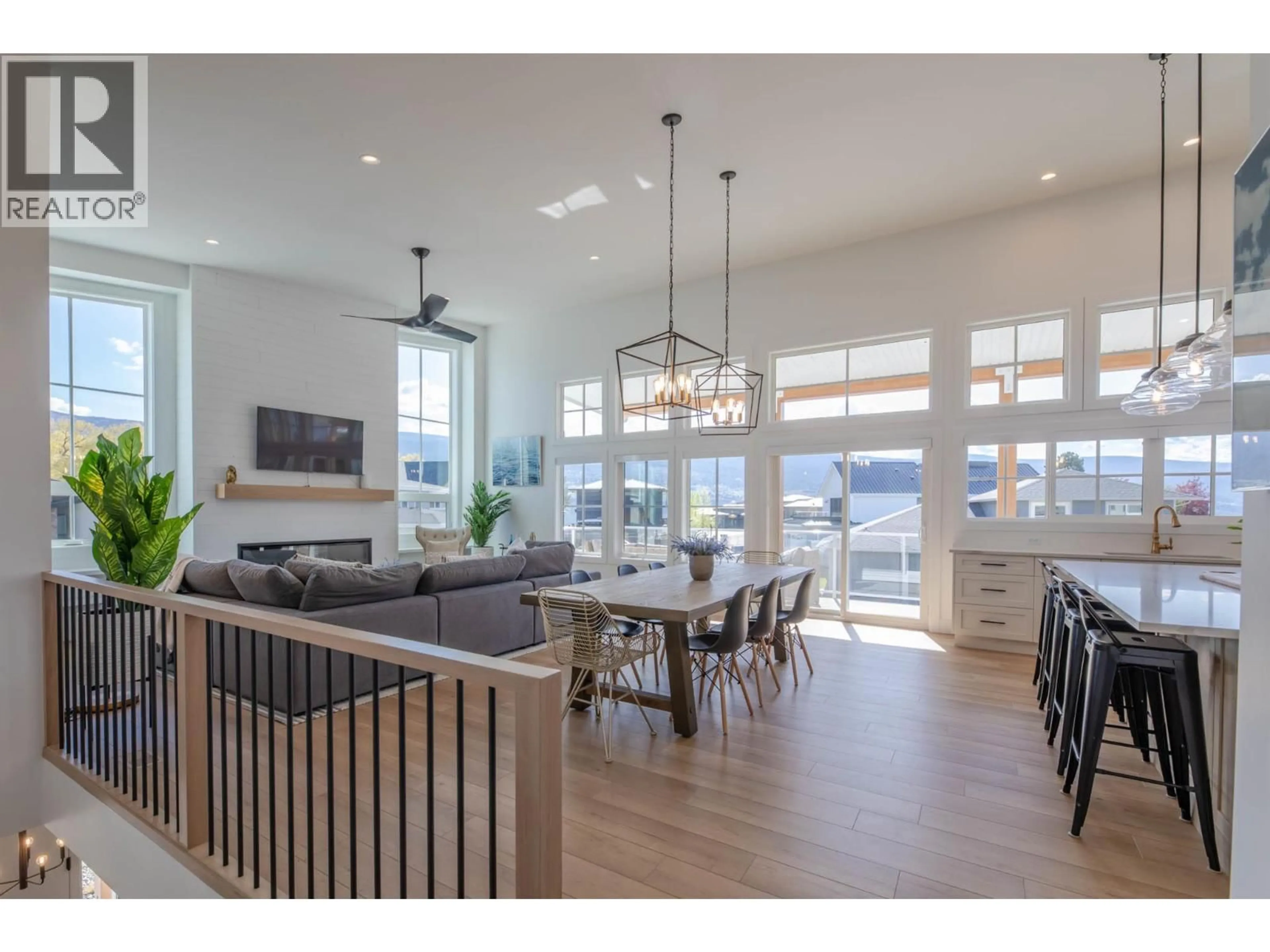 Open concept kitchen, wood/laminate floor for 881 LIGHHOUSE LANDING, Summerland British Columbia V0H1Z9