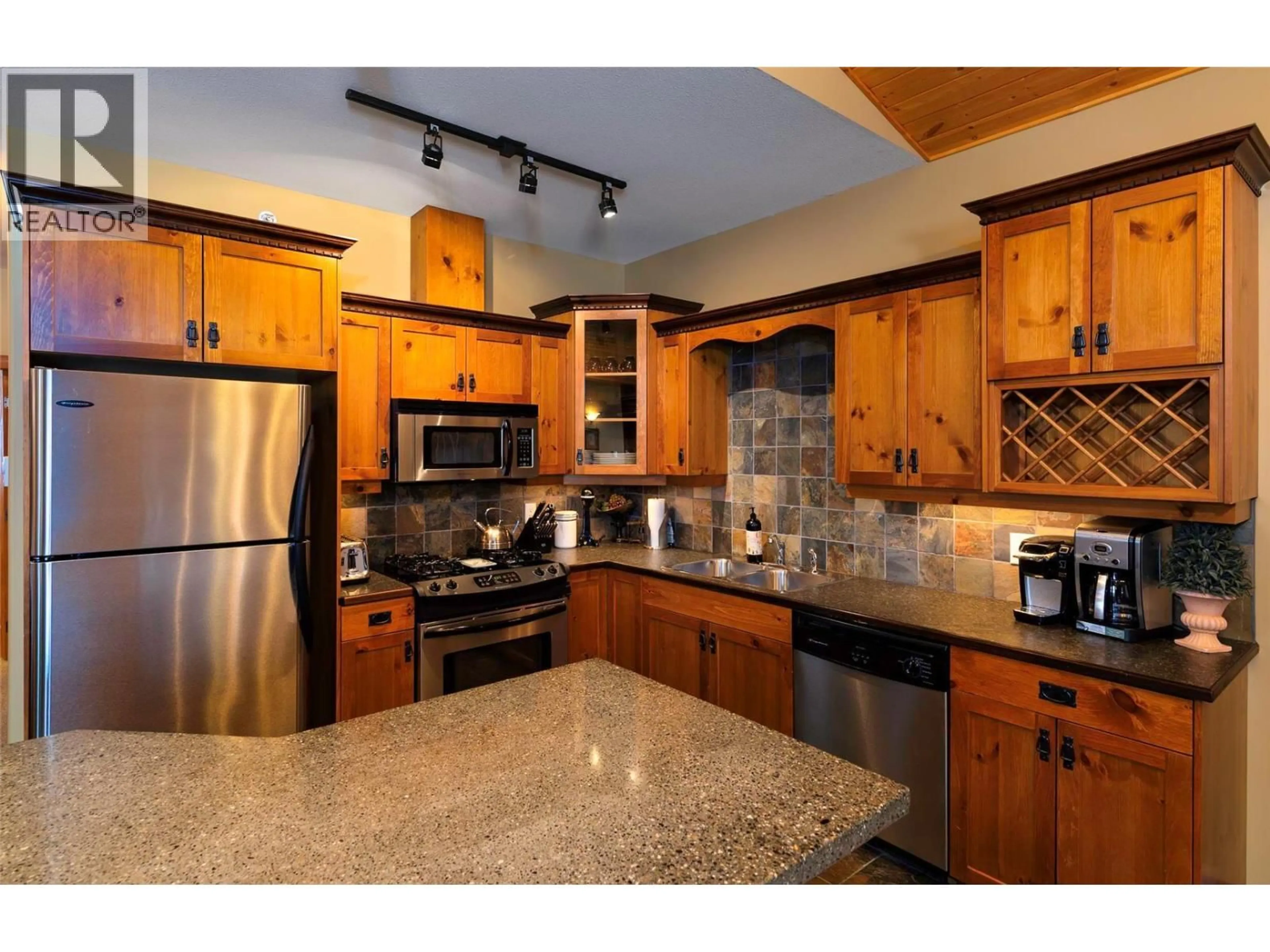 Open concept kitchen, ceramic/tile floor for 12 - 5940 SNOWPINES WAY, Big White British Columbia V1P1P3