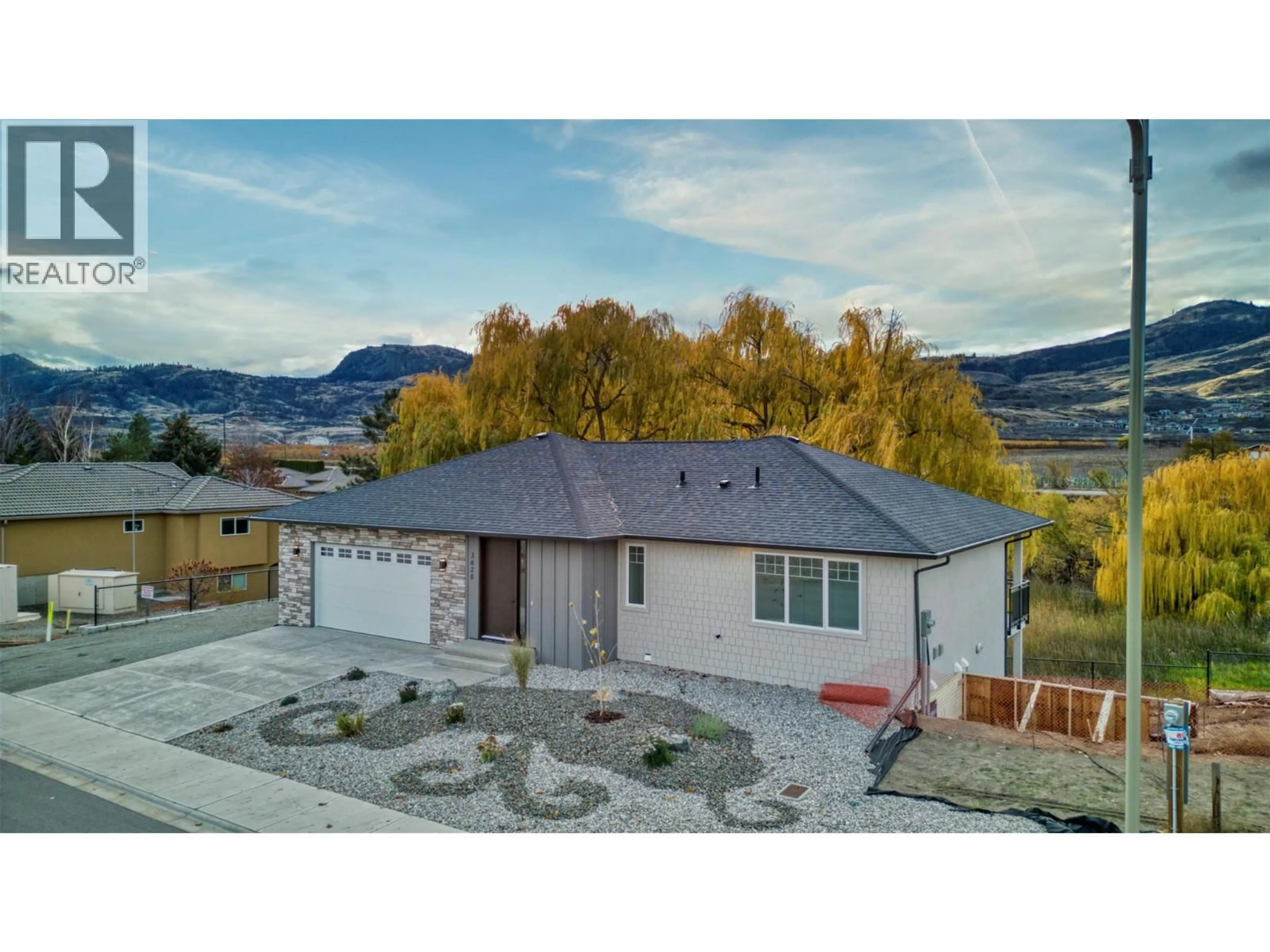 A pic from outside/outdoor area/front of a property/back of a property/a pic from drone, mountain view for 3620 LOBELIA DRIVE, Osoyoos British Columbia V0H1V1