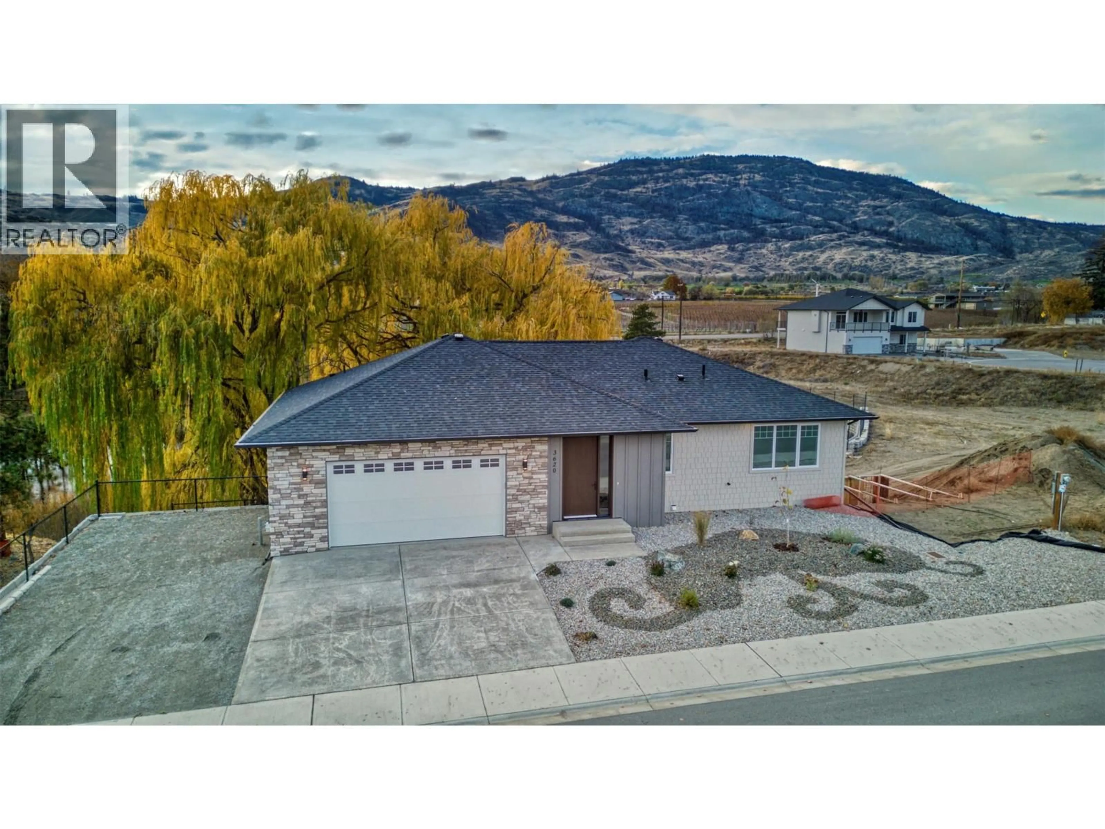 A pic from outside/outdoor area/front of a property/back of a property/a pic from drone, street for 3620 LOBELIA DRIVE, Osoyoos British Columbia V0H1V1