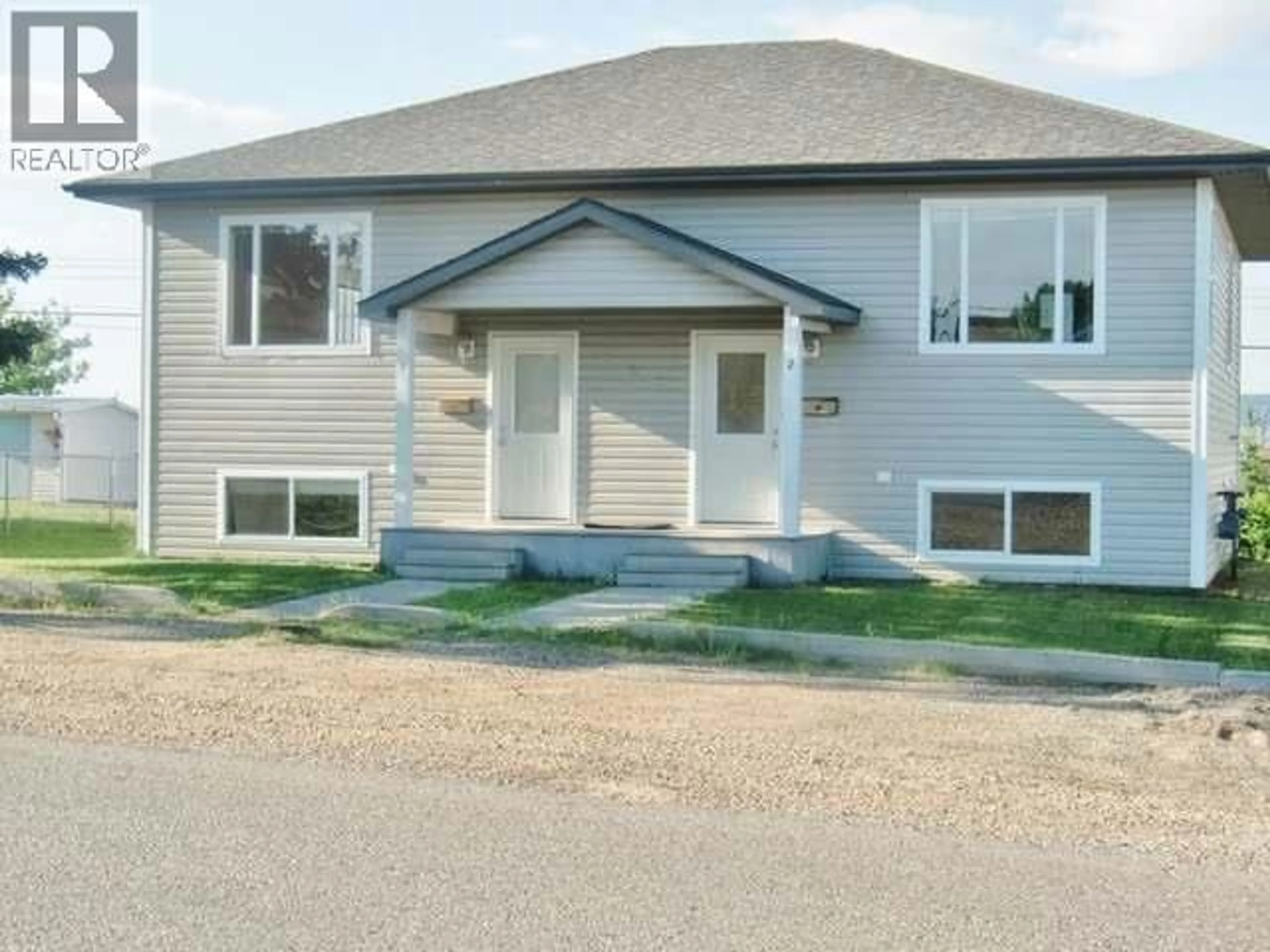 Home with vinyl exterior material, street for 509 99 AVENUE, Dawson Creek British Columbia V1G1T2