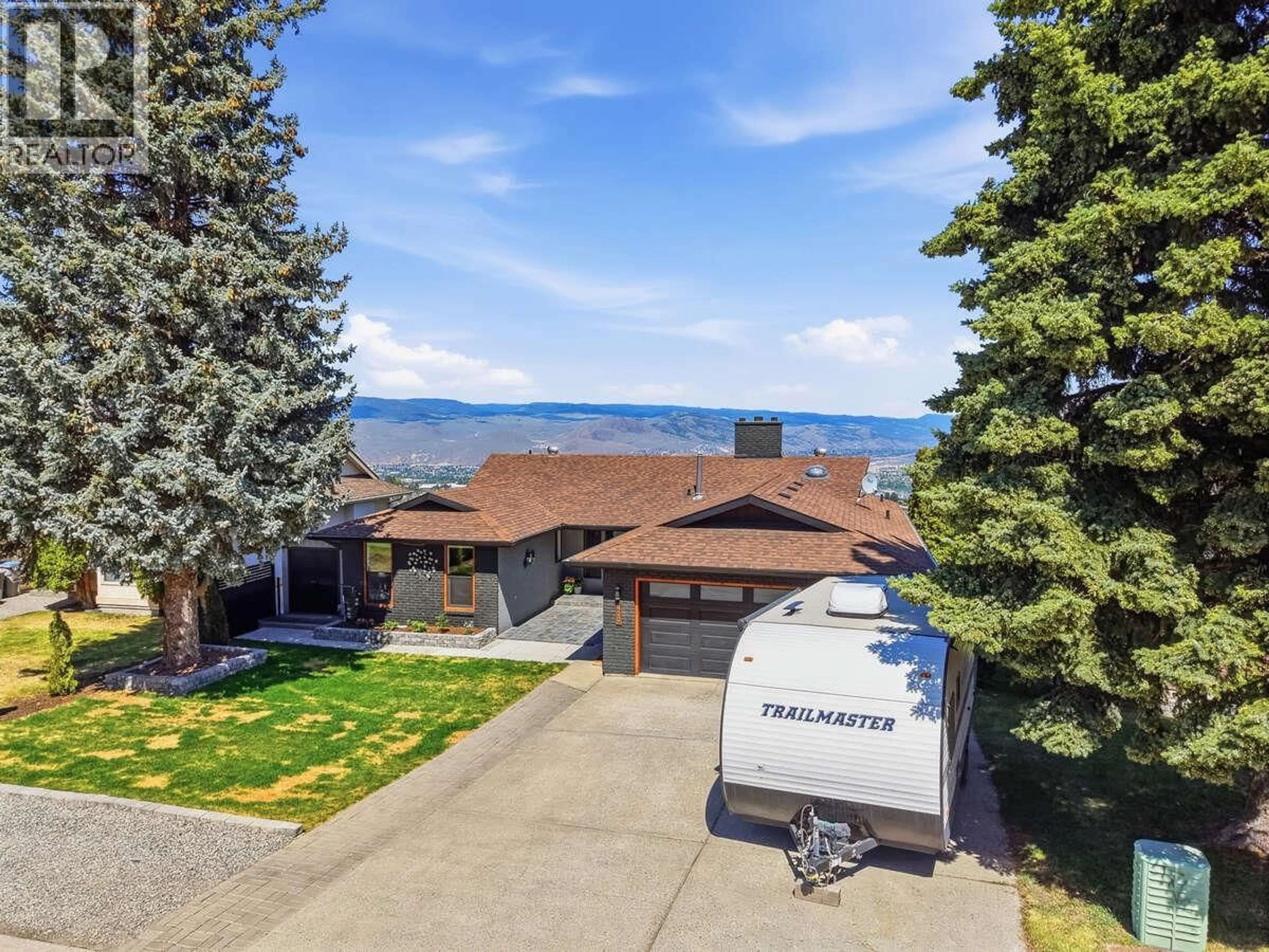 A pic from outside/outdoor area/front of a property/back of a property/a pic from drone, water/lake/river/ocean view for 420 GLENEAGLES DRIVE, Kamloops British Columbia V2E1Z4