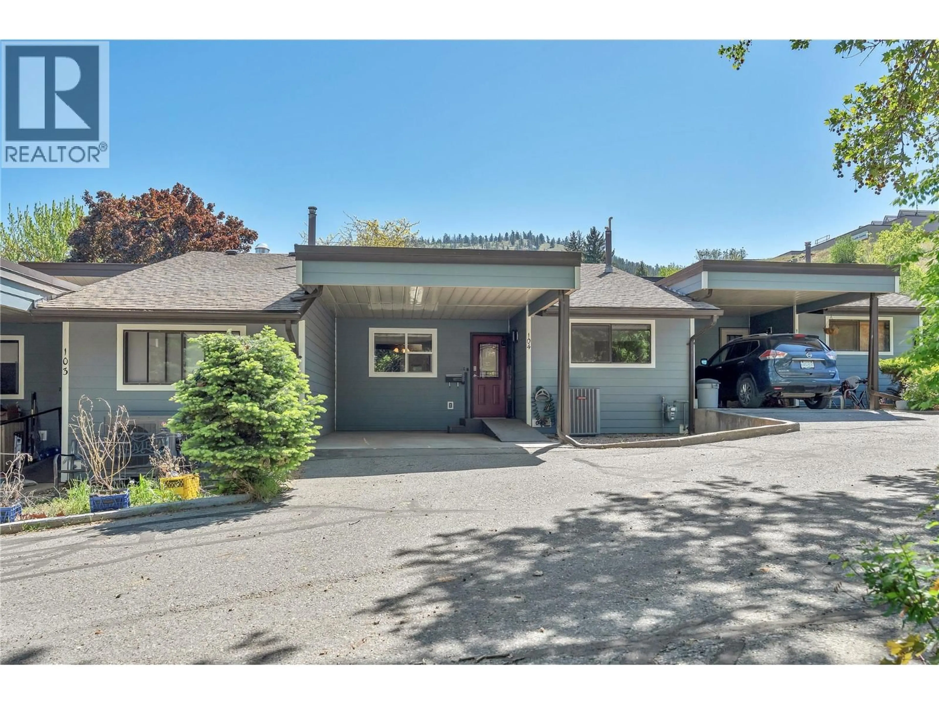 Home with vinyl exterior material, street for 104 - 7717 PRAIRIE VALLEY ROAD, Summerland British Columbia V0H1Z4
