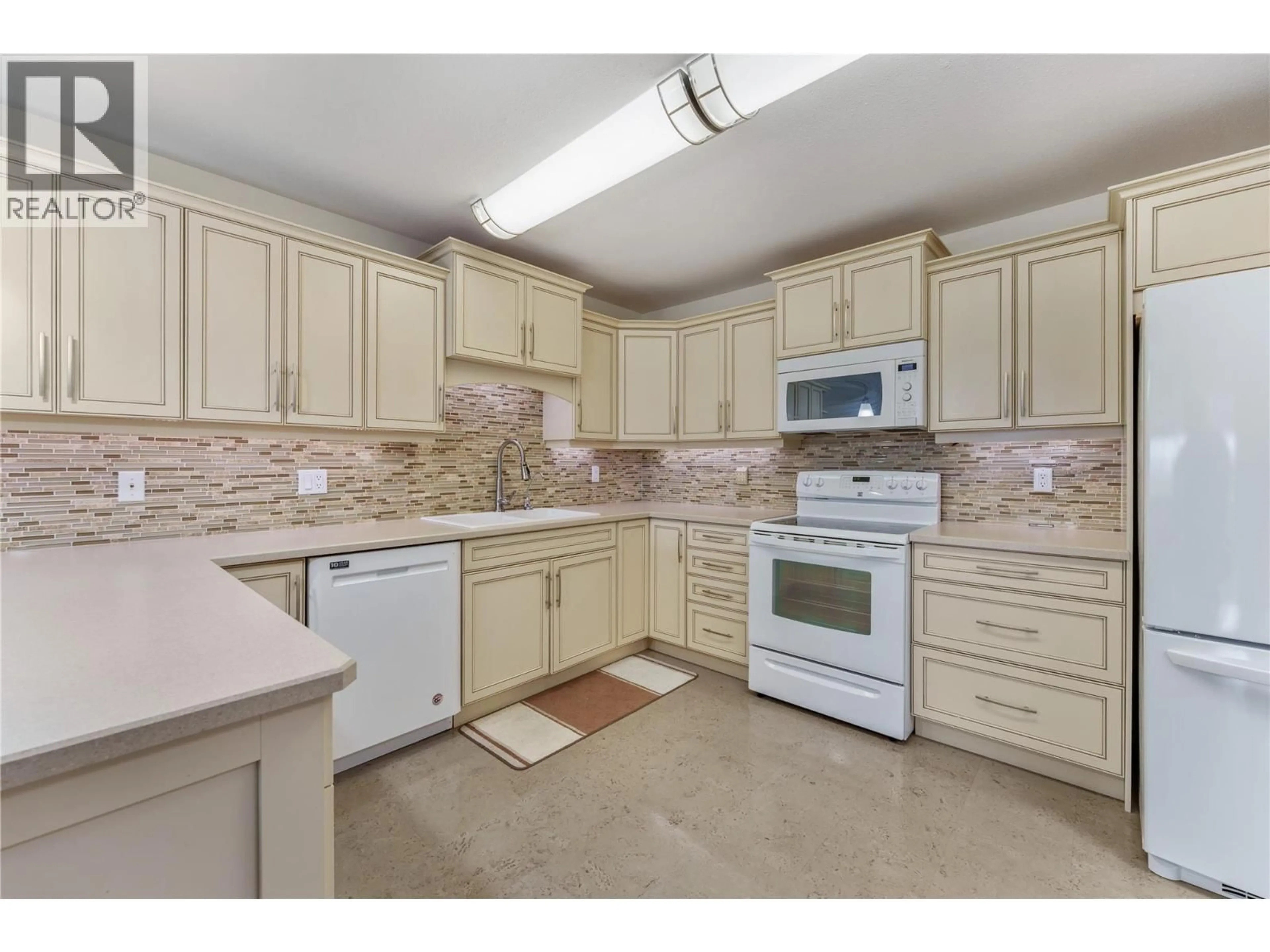 Standard kitchen, ceramic/tile floor for 310 - 2477 INGRAM ROAD, West Kelowna British Columbia V4T1W7