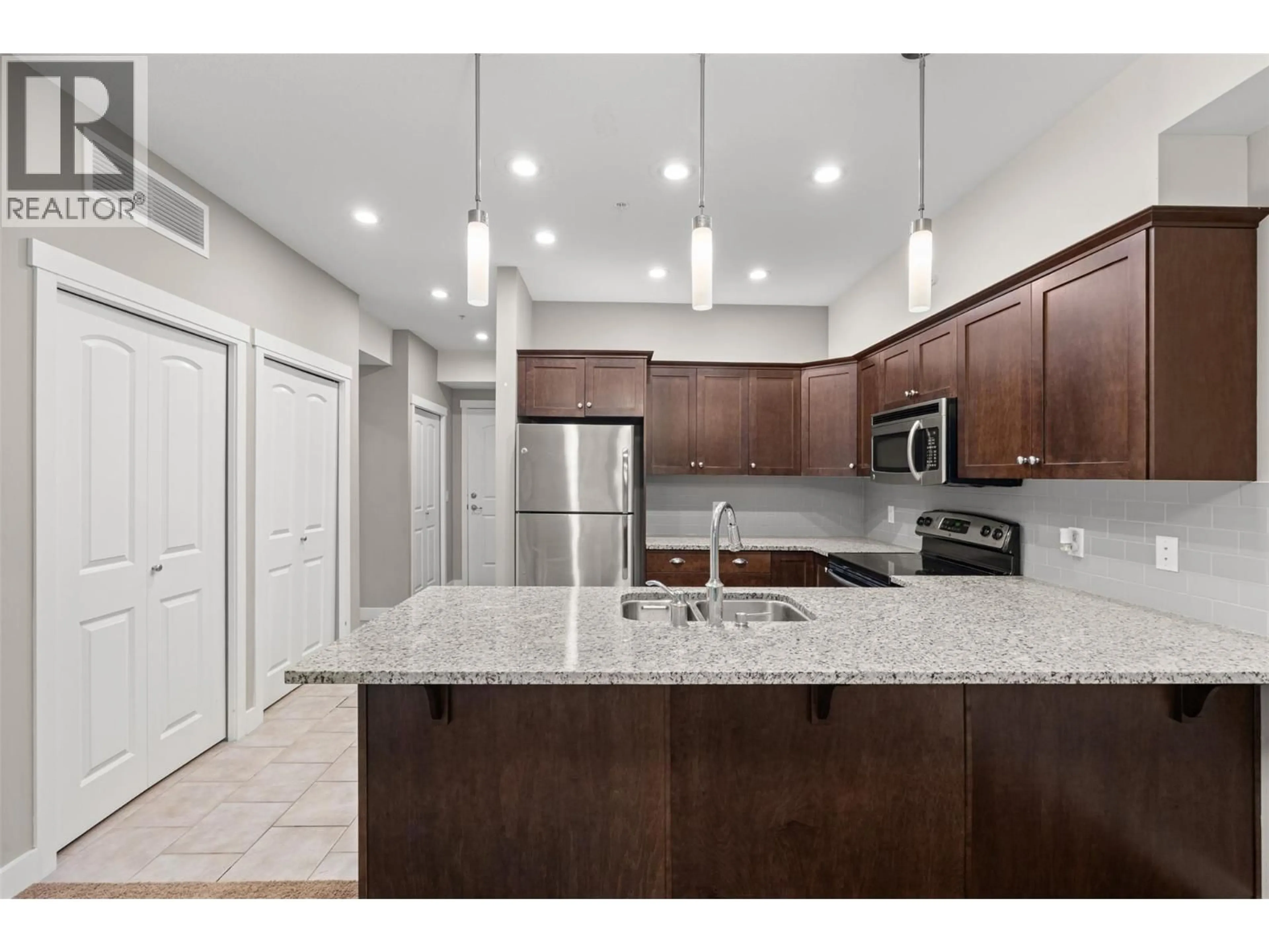 Open concept kitchen, unknown for 3205 - 1990 UPPER SUNDANCE DRIVE, West Kelowna British Columbia V4T3E7