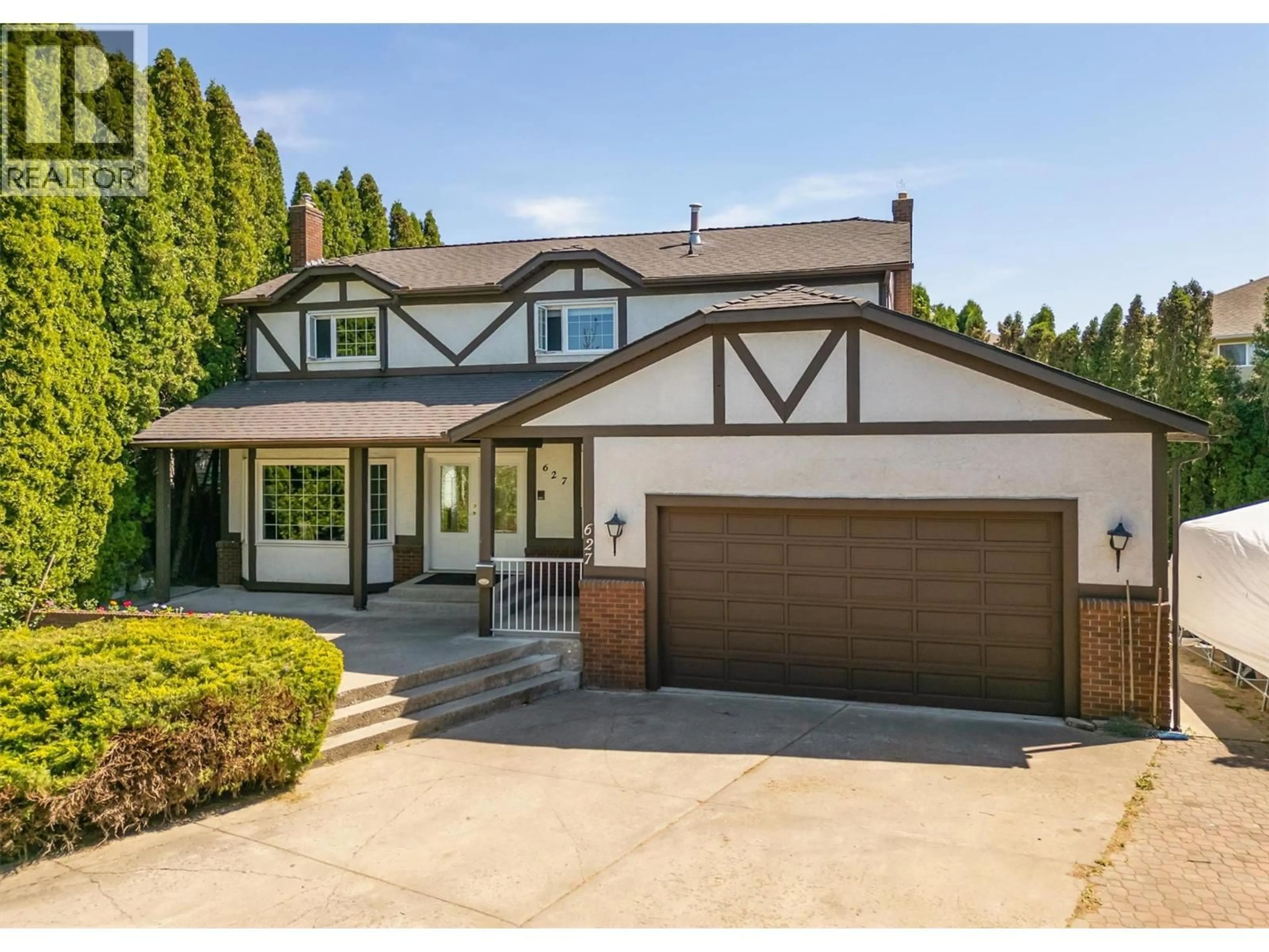 Home with brick exterior material, street for 627 HARDIE ROAD, Kelowna British Columbia V1X6W9