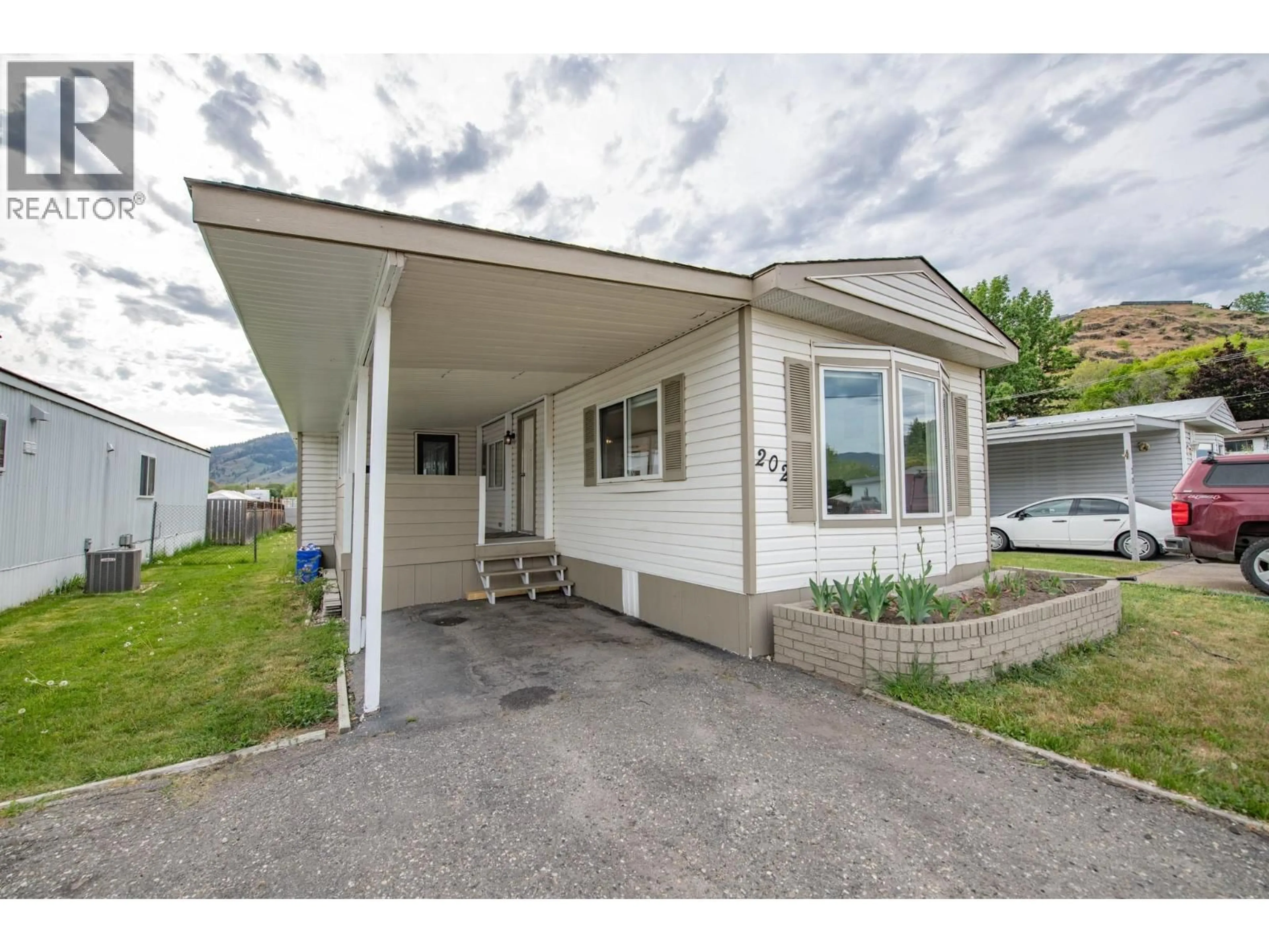 Home with vinyl exterior material, unknown for 6710 TRONSON ROAD, Vernon British Columbia V1H1X6
