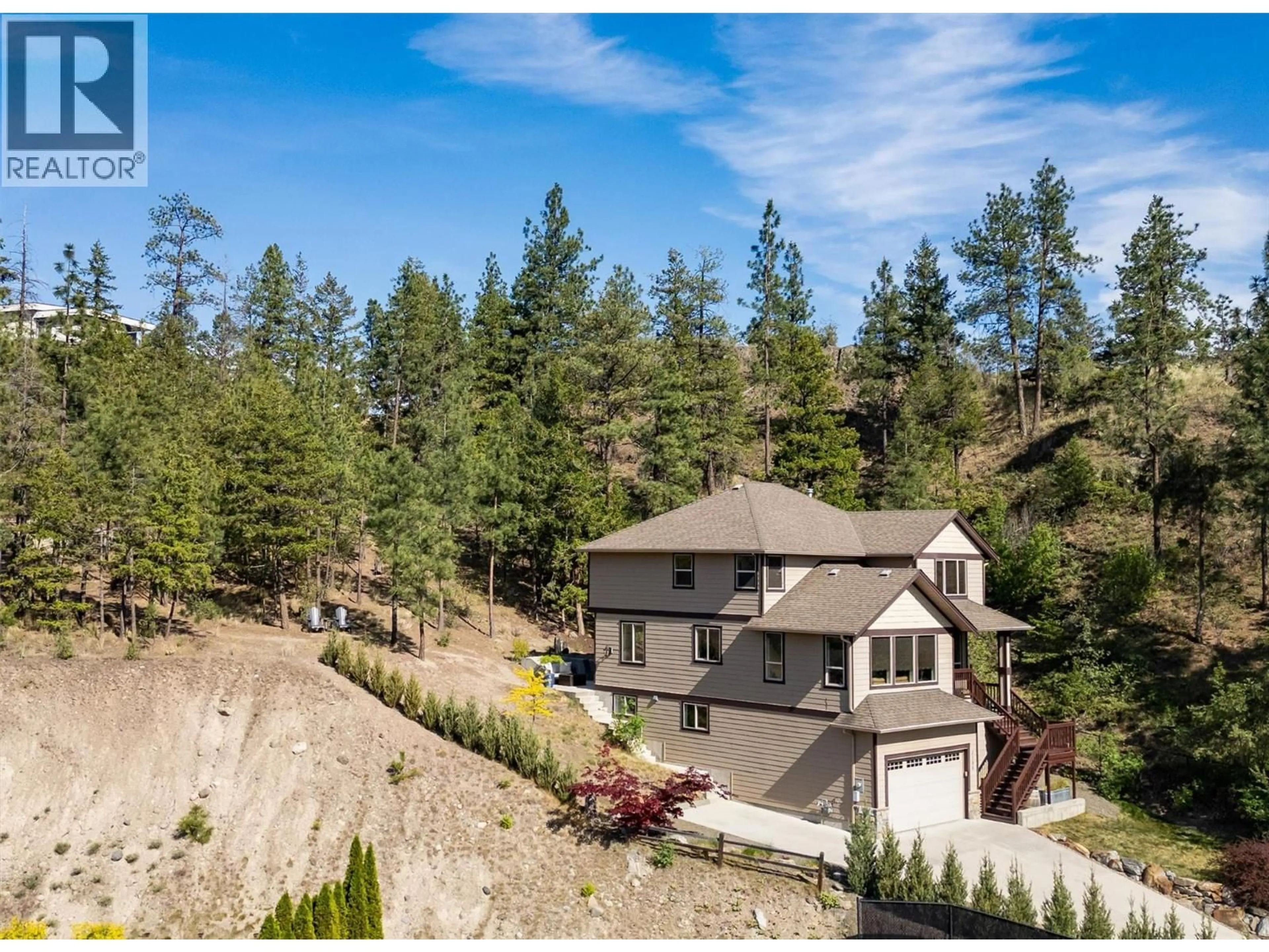 A pic from outside/outdoor area/front of a property/back of a property/a pic from drone, mountain view for 2200 SUNVIEW DRIVE, West Kelowna British Columbia V1Z3X9