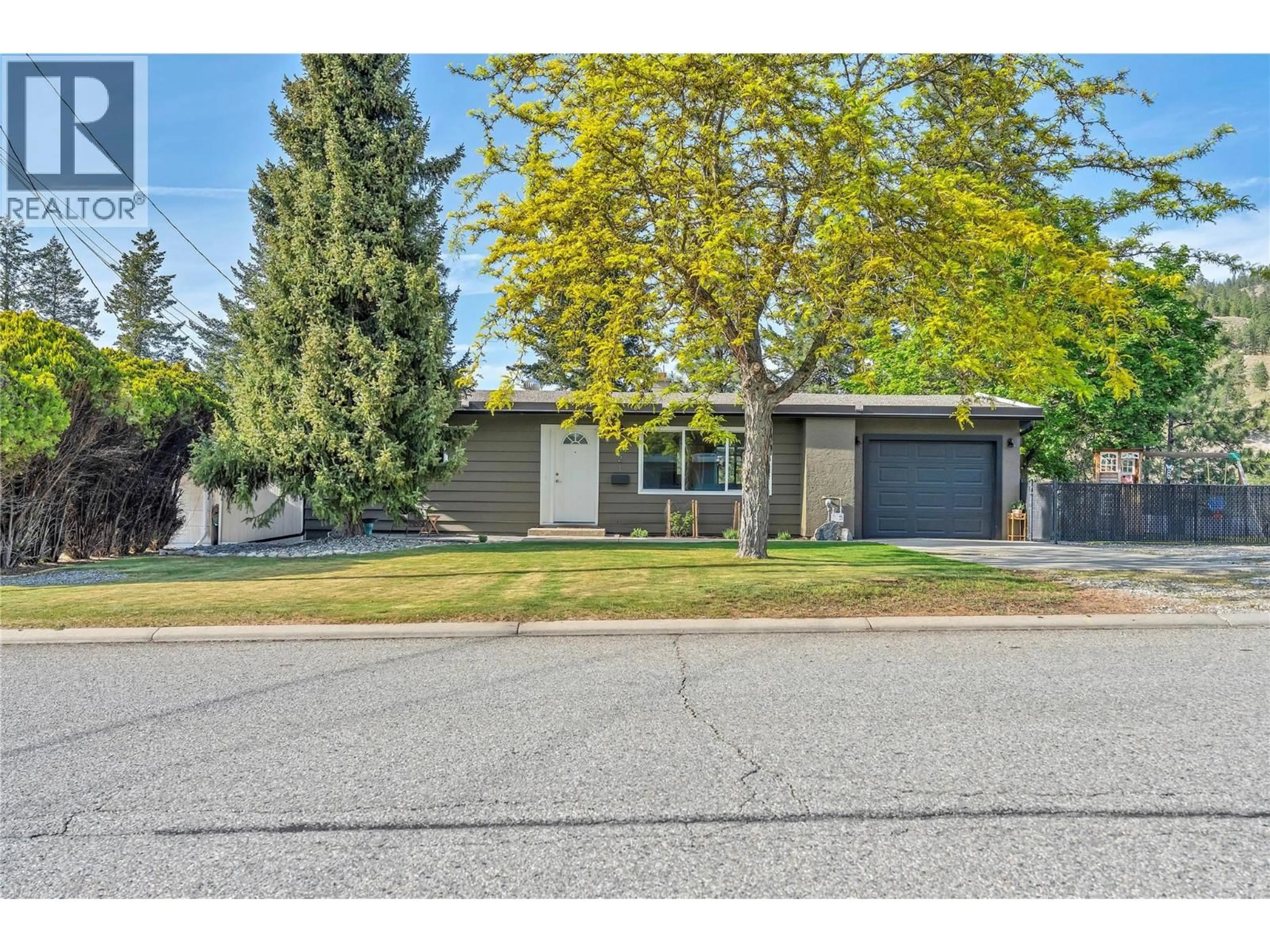 Home with vinyl exterior material, street for 1421 RIDGEDALE AVENUE, Penticton British Columbia V2A2S3