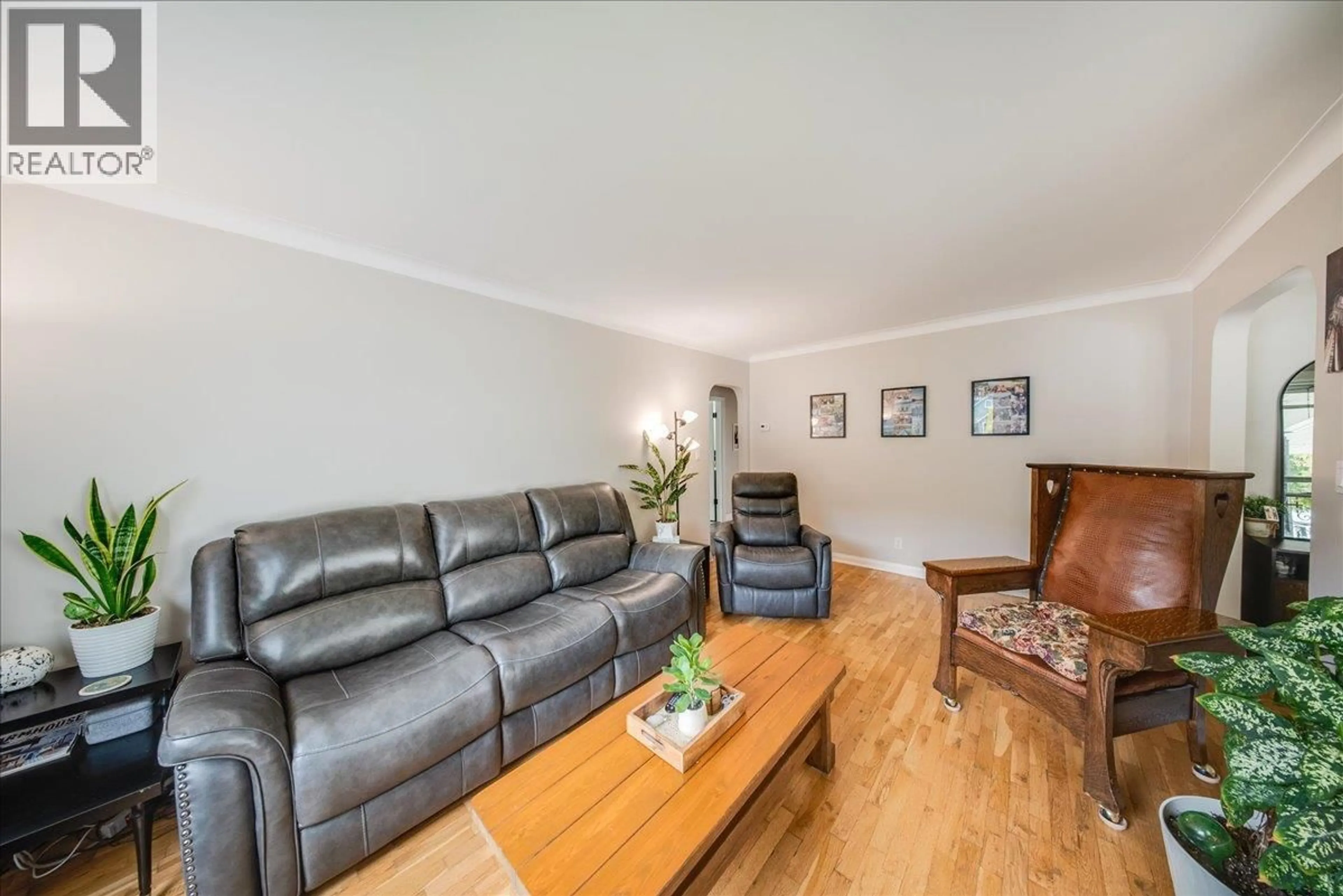 Living room with furniture, wood/laminate floor for 2120 SIXTH AVENUE, Trail British Columbia V1R3B7