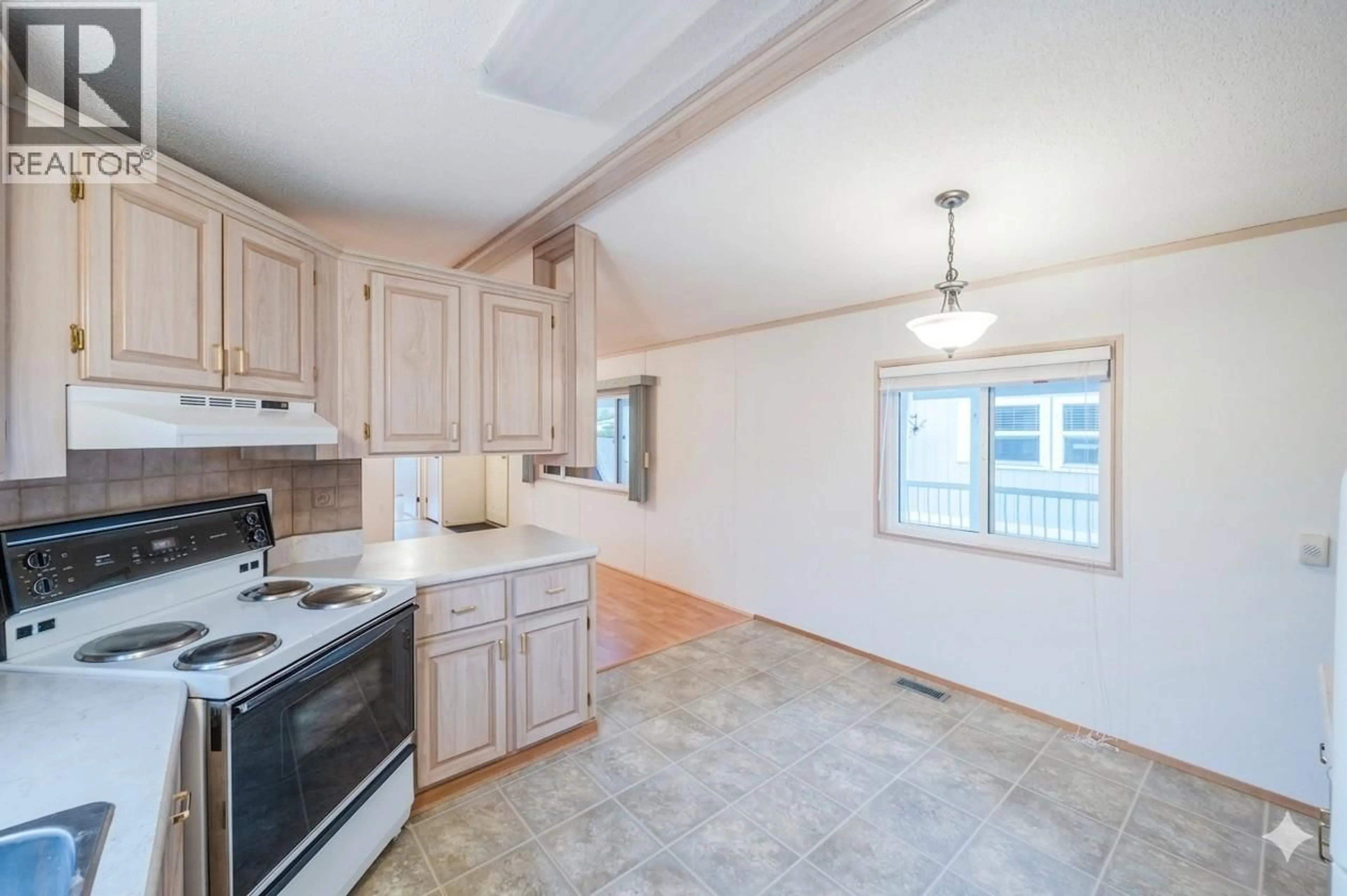 Open concept kitchen, ceramic/tile floor for 39 - 6778 TUCELNUIT DRIVE, Oliver British Columbia V0H1T0