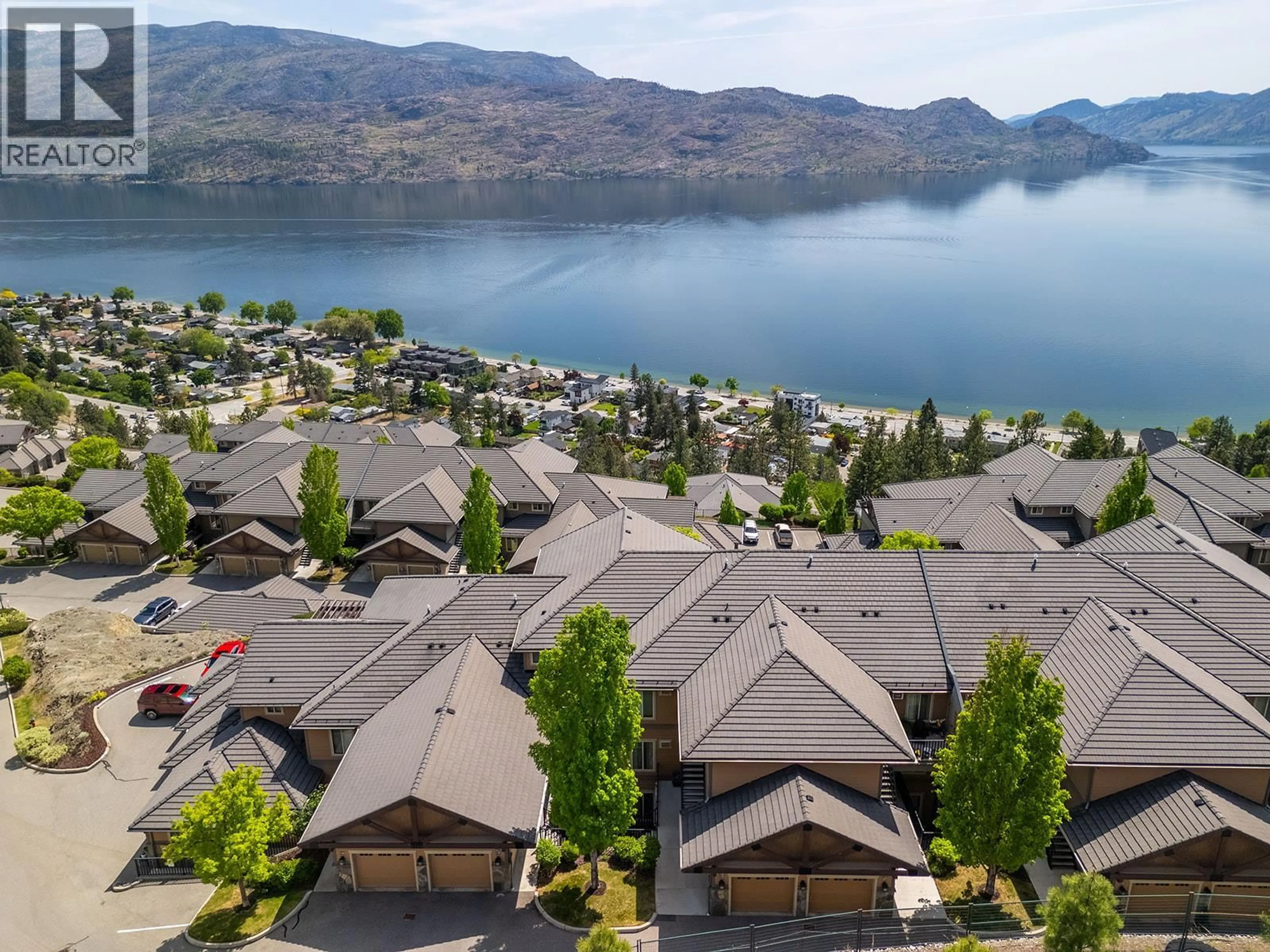A pic from outside/outdoor area/front of a property/back of a property/a pic from drone, water/lake/river/ocean view for 134 - 4350 PONDEROSA DRIVE, Peachland British Columbia V0H1X5