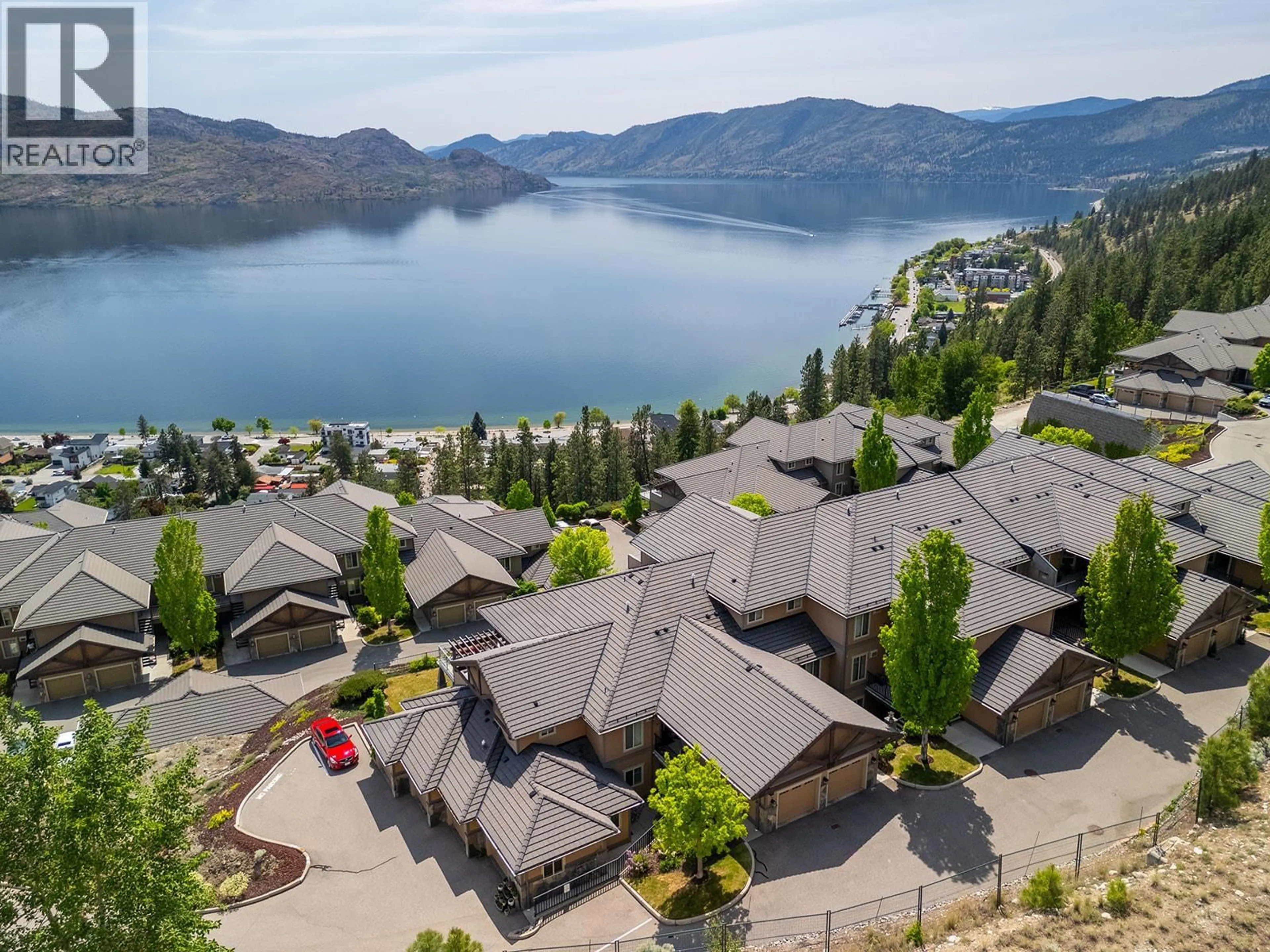 A pic from outside/outdoor area/front of a property/back of a property/a pic from drone, water/lake/river/ocean view for 134 - 4350 PONDEROSA DRIVE, Peachland British Columbia V0H1X5