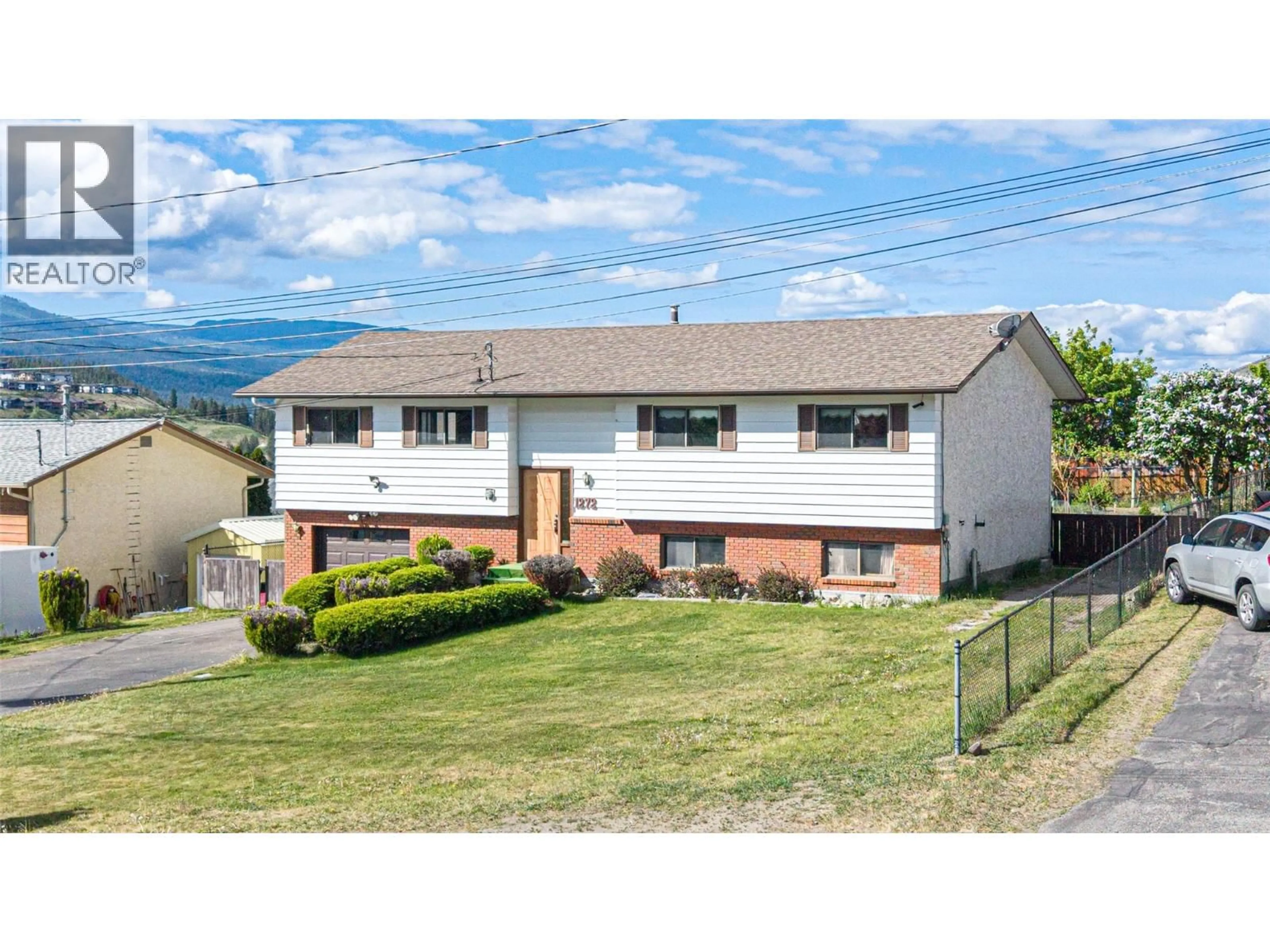 Home with vinyl exterior material, mountain view for 1272 ST CLARE COURT, Kelowna British Columbia V1P1L6