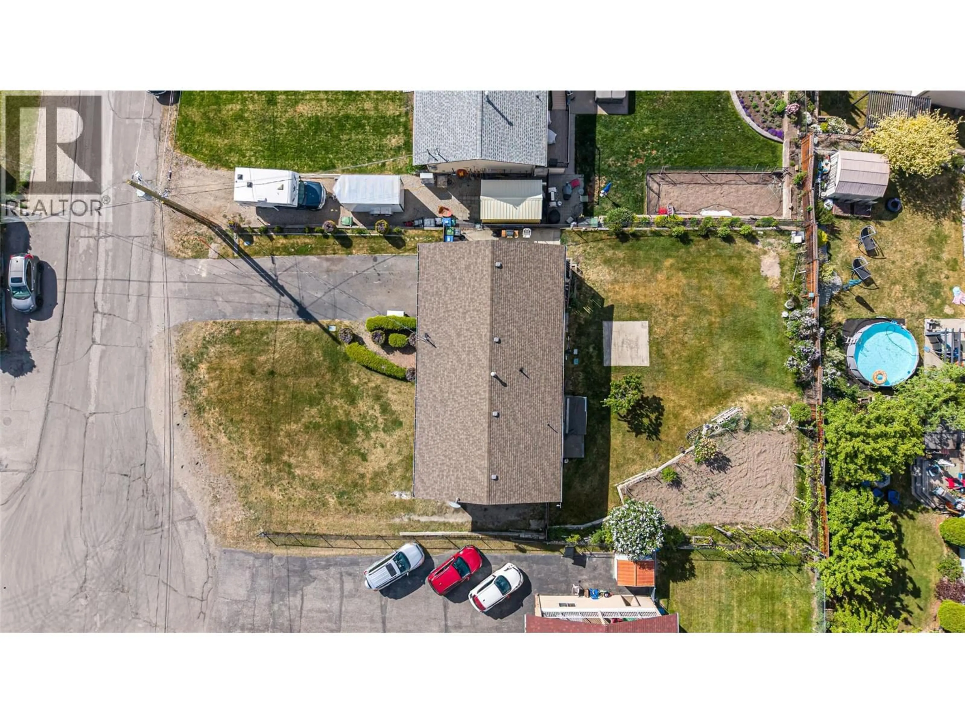A pic from outside/outdoor area/front of a property/back of a property/a pic from drone, street for 1272 ST CLARE COURT, Kelowna British Columbia V1P1L6
