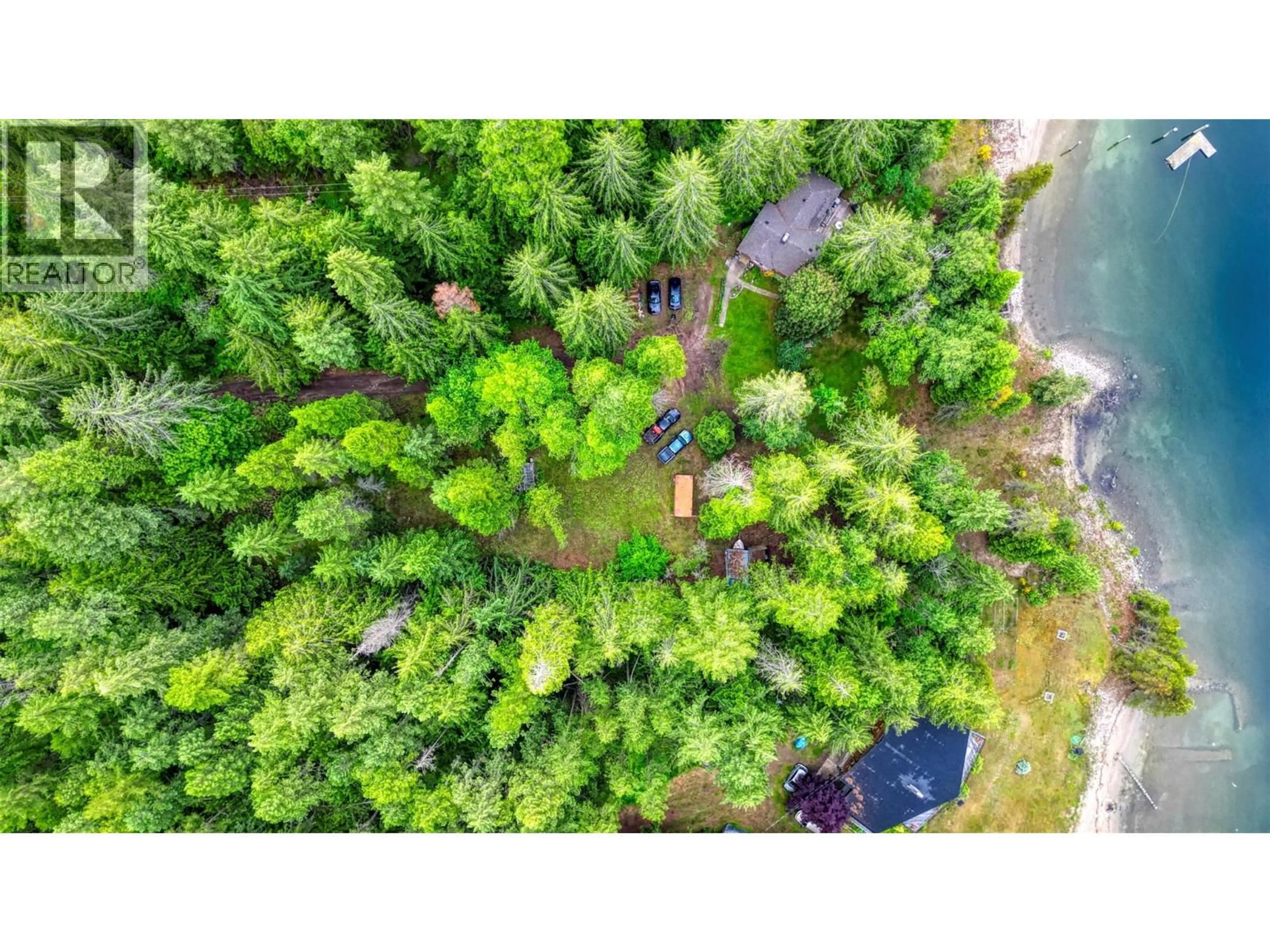 A pic from outside/outdoor area/front of a property/back of a property/a pic from drone, forest/trees view for 7022 HIGHWAY 3A OTHER, Balfour British Columbia V1L6R9