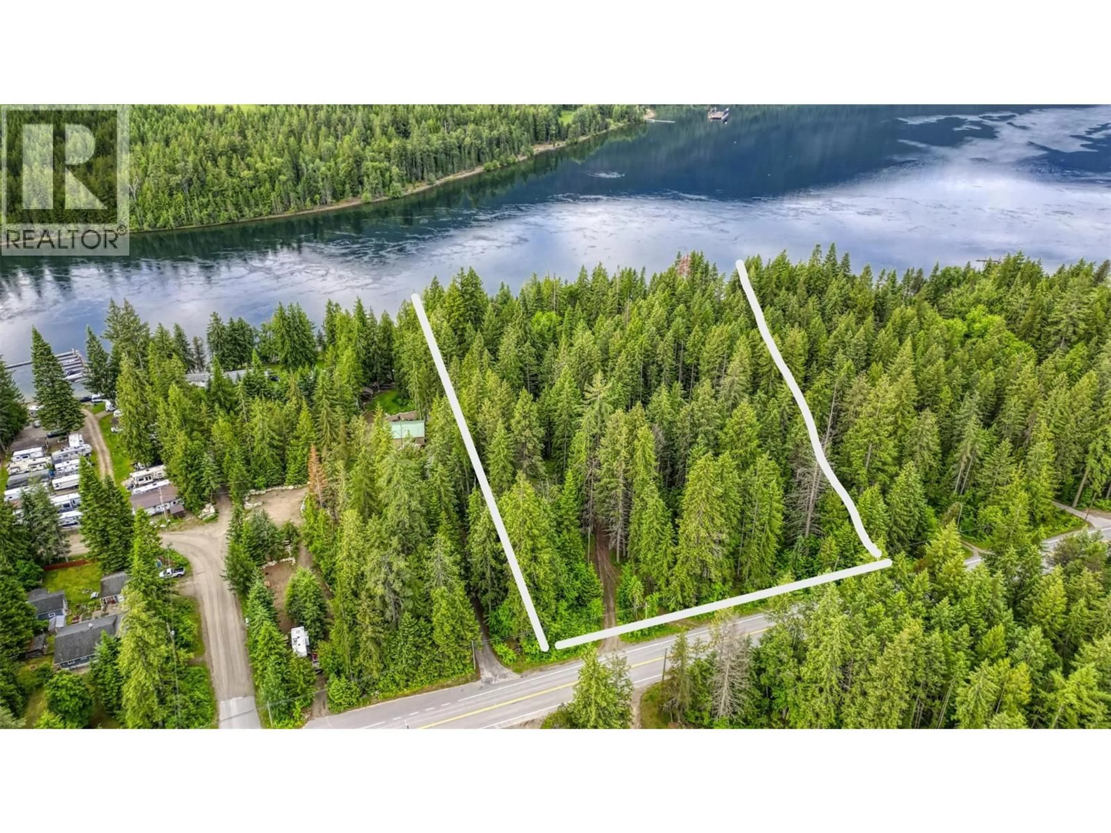 A pic from outside/outdoor area/front of a property/back of a property/a pic from drone, water/lake/river/ocean view for 7022 HIGHWAY 3A OTHER, Balfour British Columbia V1L6R9