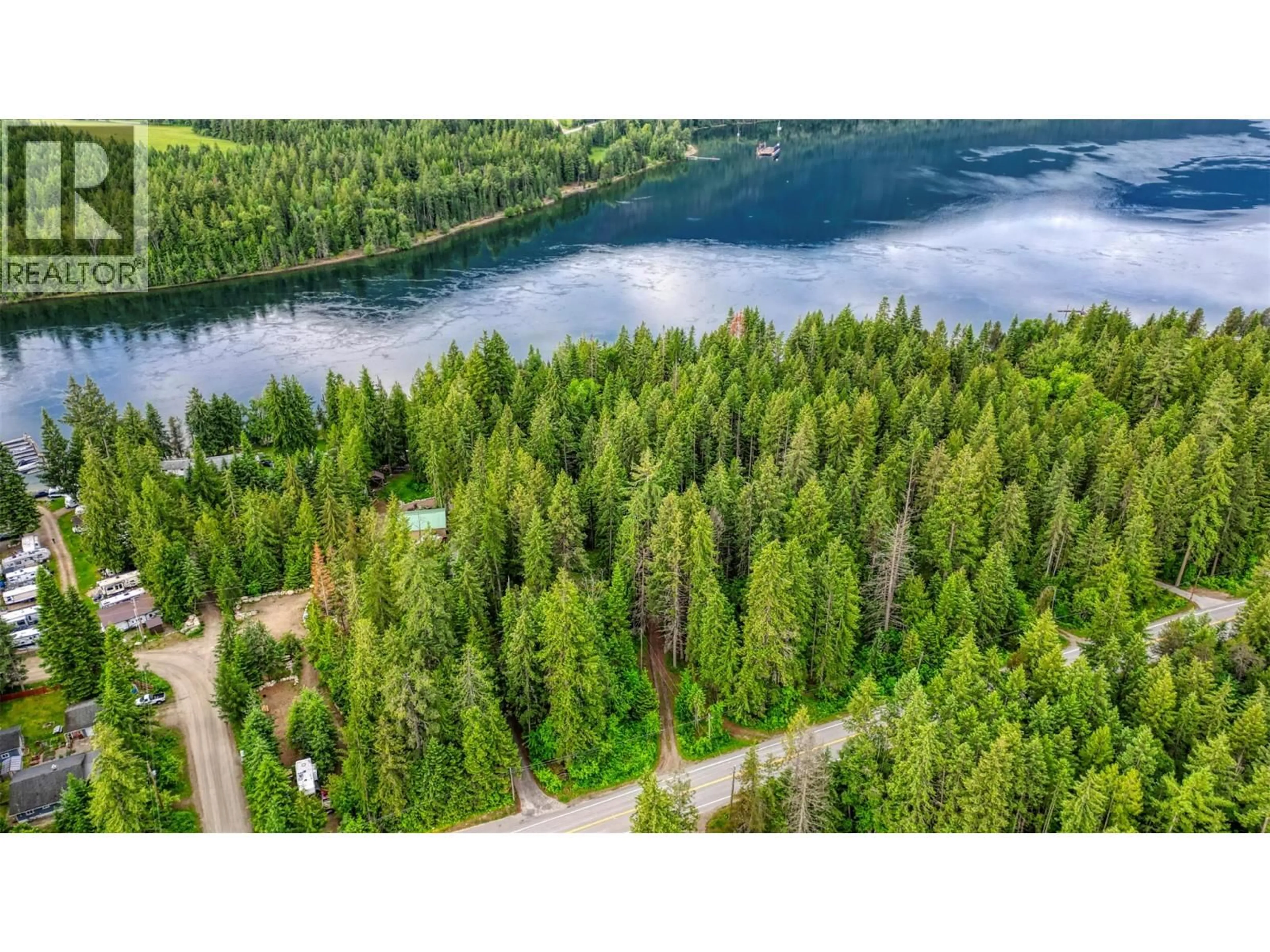 A pic from outside/outdoor area/front of a property/back of a property/a pic from drone, water/lake/river/ocean view for 7022 HIGHWAY 3A OTHER, Balfour British Columbia V1L6R9