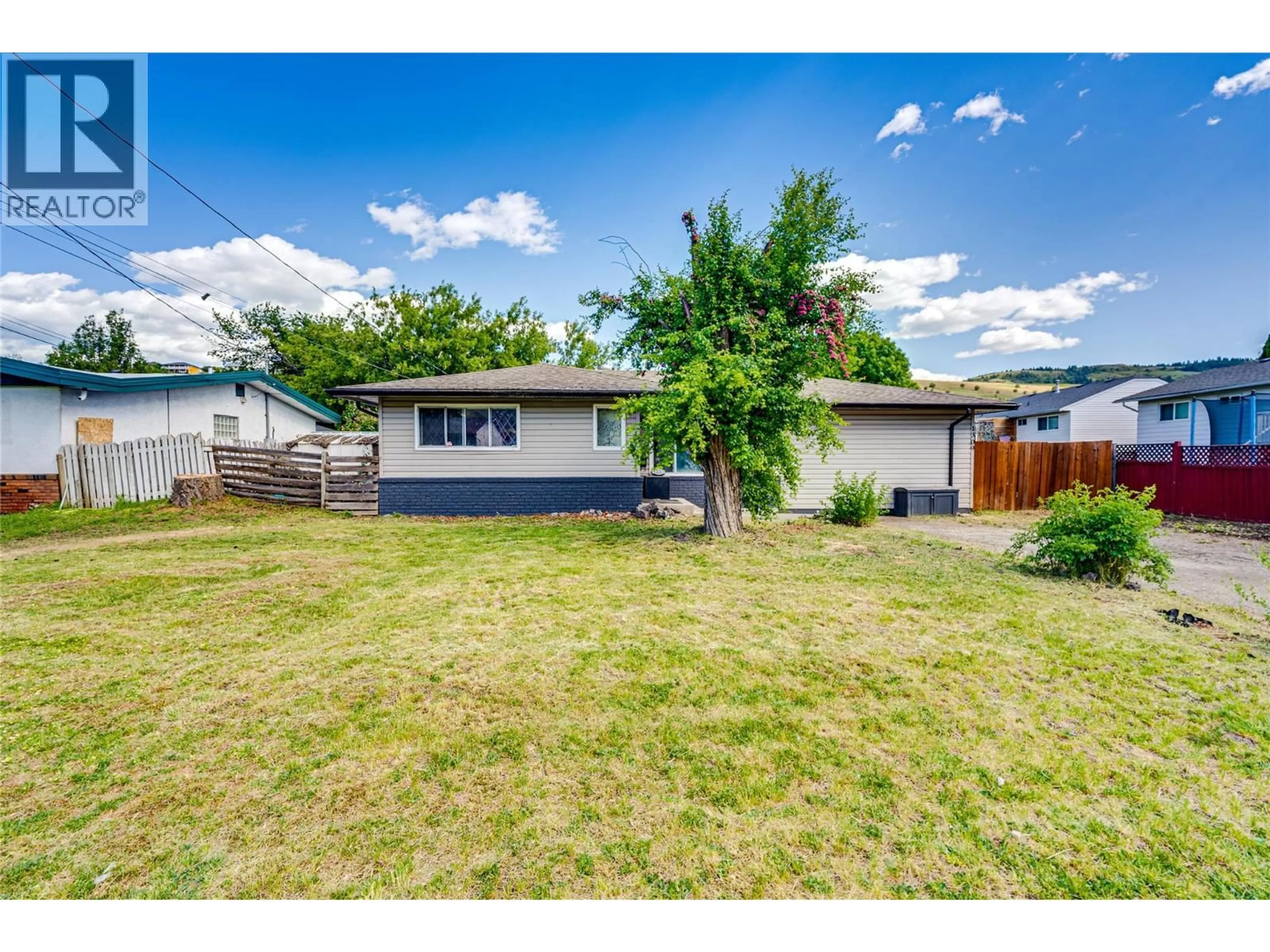A pic from outside/outdoor area/front of a property/back of a property/a pic from drone, street for 1309 43 STREET, Vernon British Columbia V1T7R7