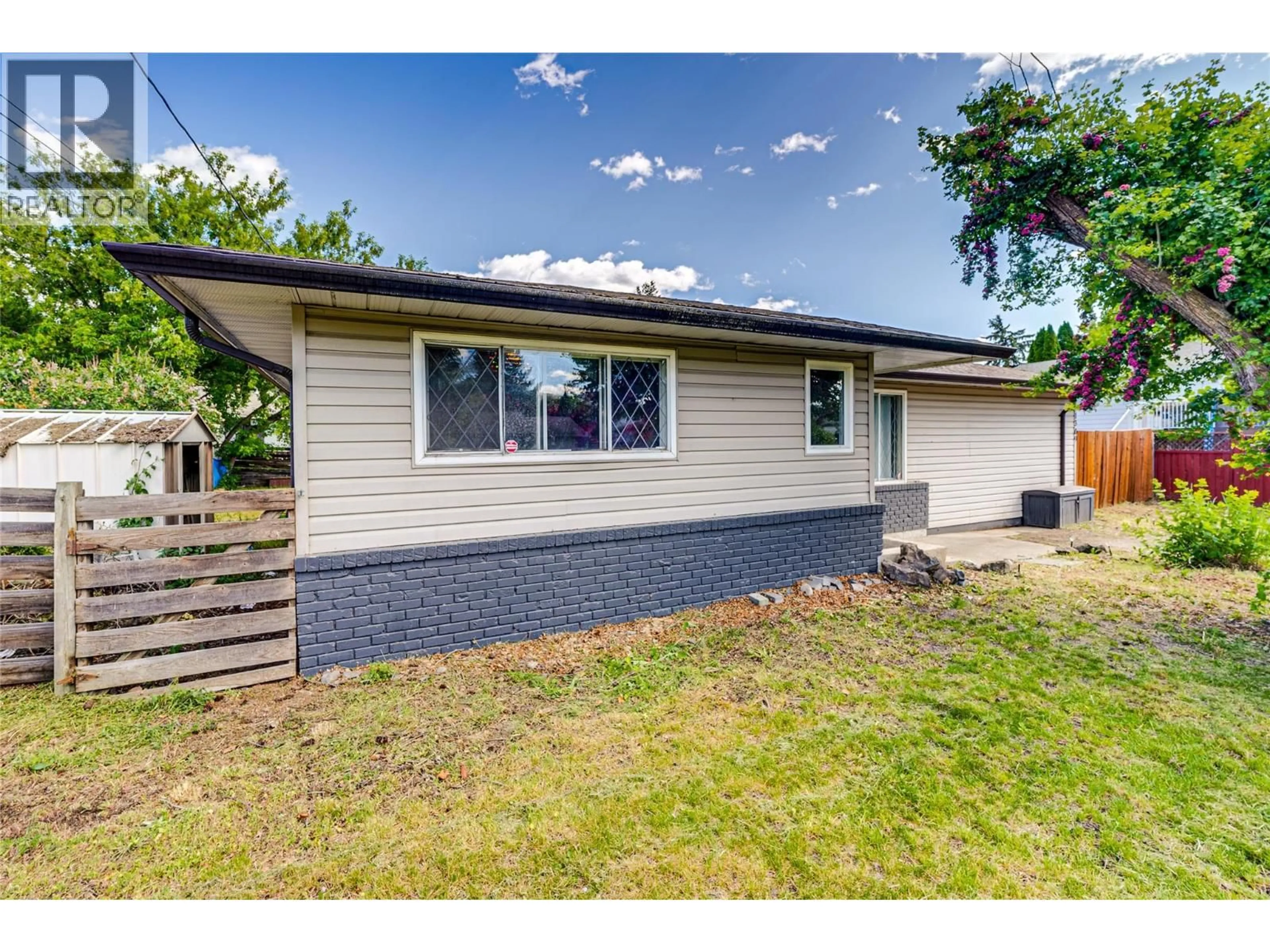 Home with vinyl exterior material, street for 1309 43 STREET, Vernon British Columbia V1T7R7