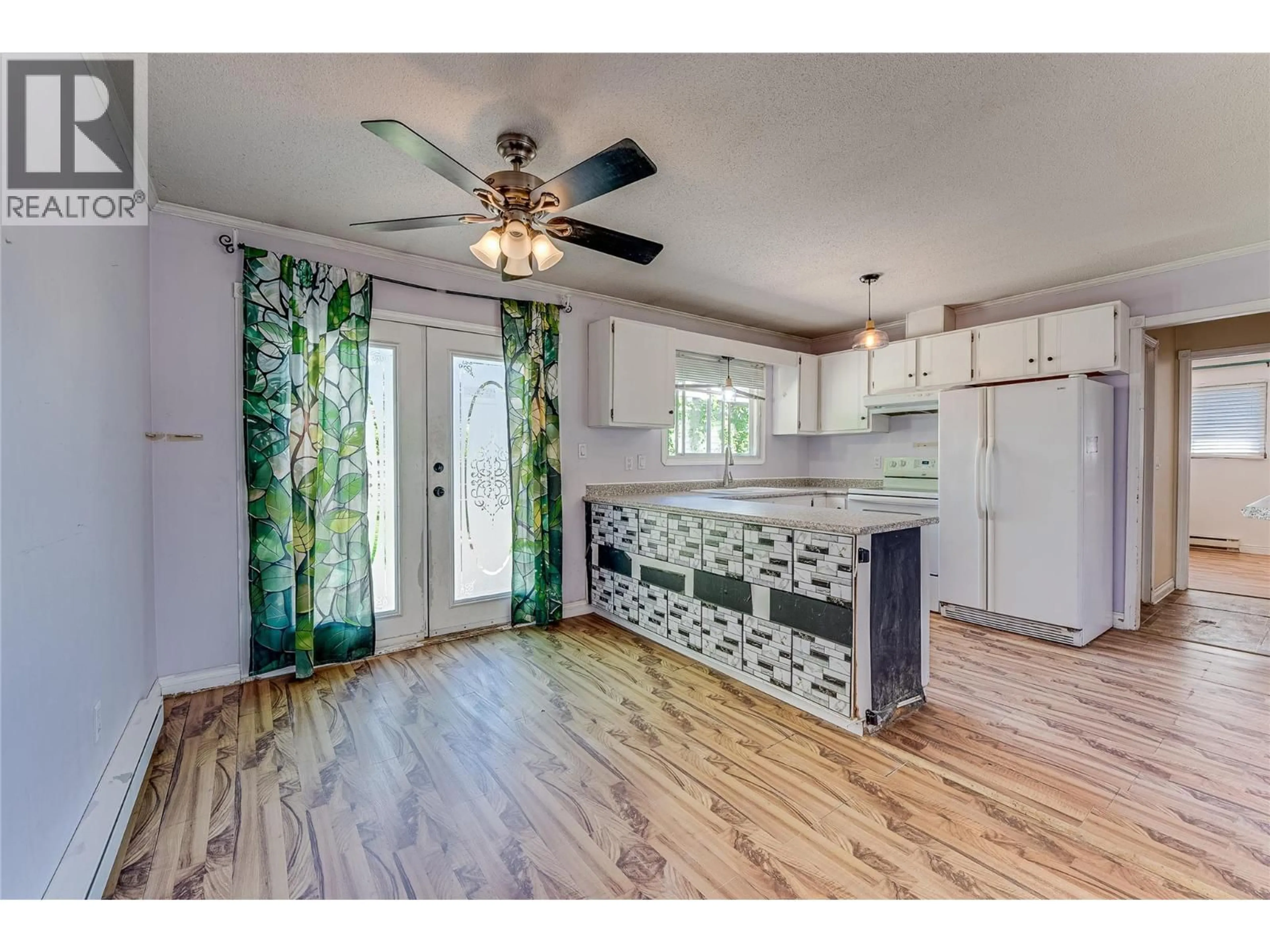 Open concept kitchen, unknown for 1309 43 STREET, Vernon British Columbia V1T7R7