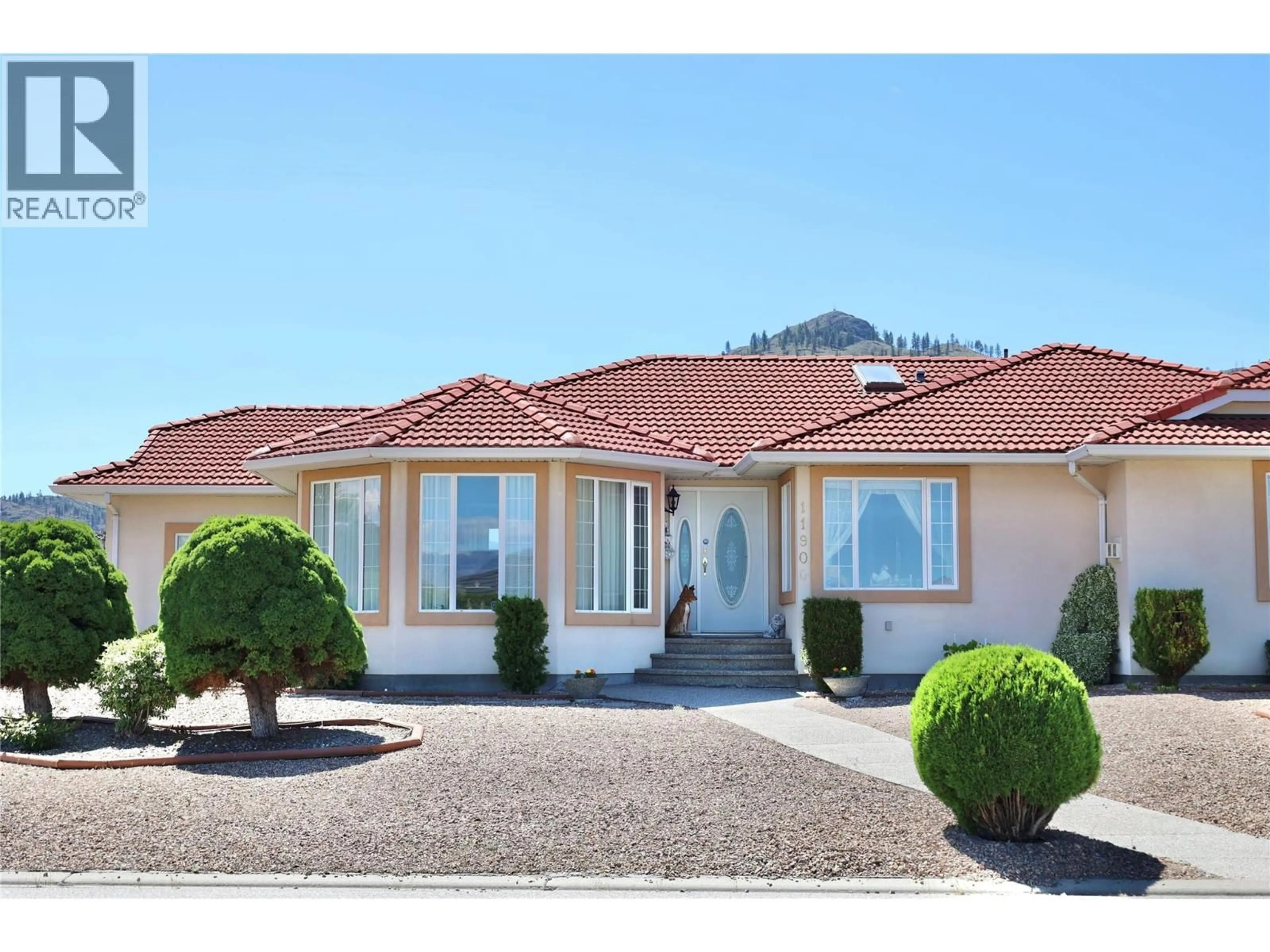 Home with vinyl exterior material, street for 11900 OLYMPIC VIEW, Osoyoos British Columbia V0H1V4