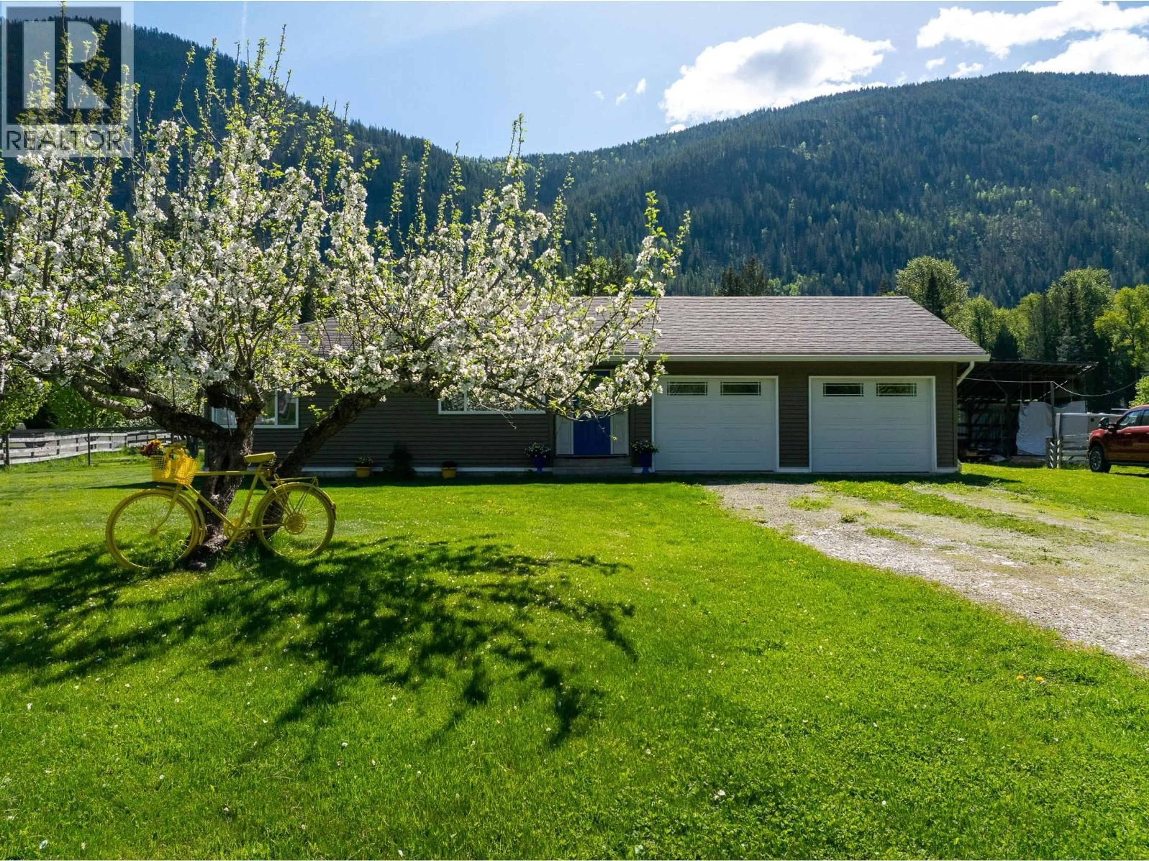 A pic from outside/outdoor area/front of a property/back of a property/a pic from drone, mountain view for 8895 HIGHWAY 6 HIGHWAY, Salmo British Columbia V0G1Z0