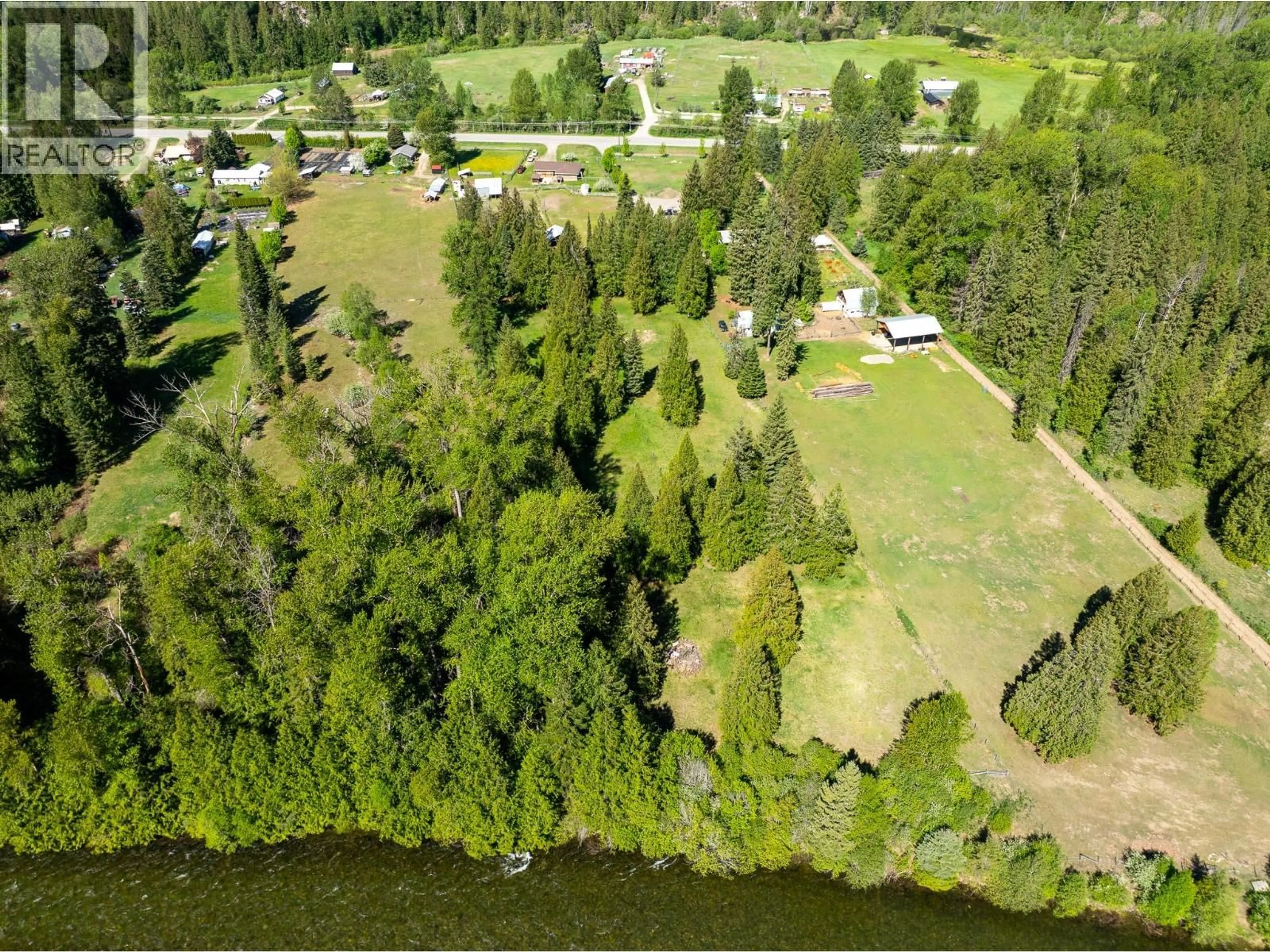 A pic from outside/outdoor area/front of a property/back of a property/a pic from drone, water/lake/river/ocean view for 8895 HIGHWAY 6 HIGHWAY, Salmo British Columbia V0G1Z0