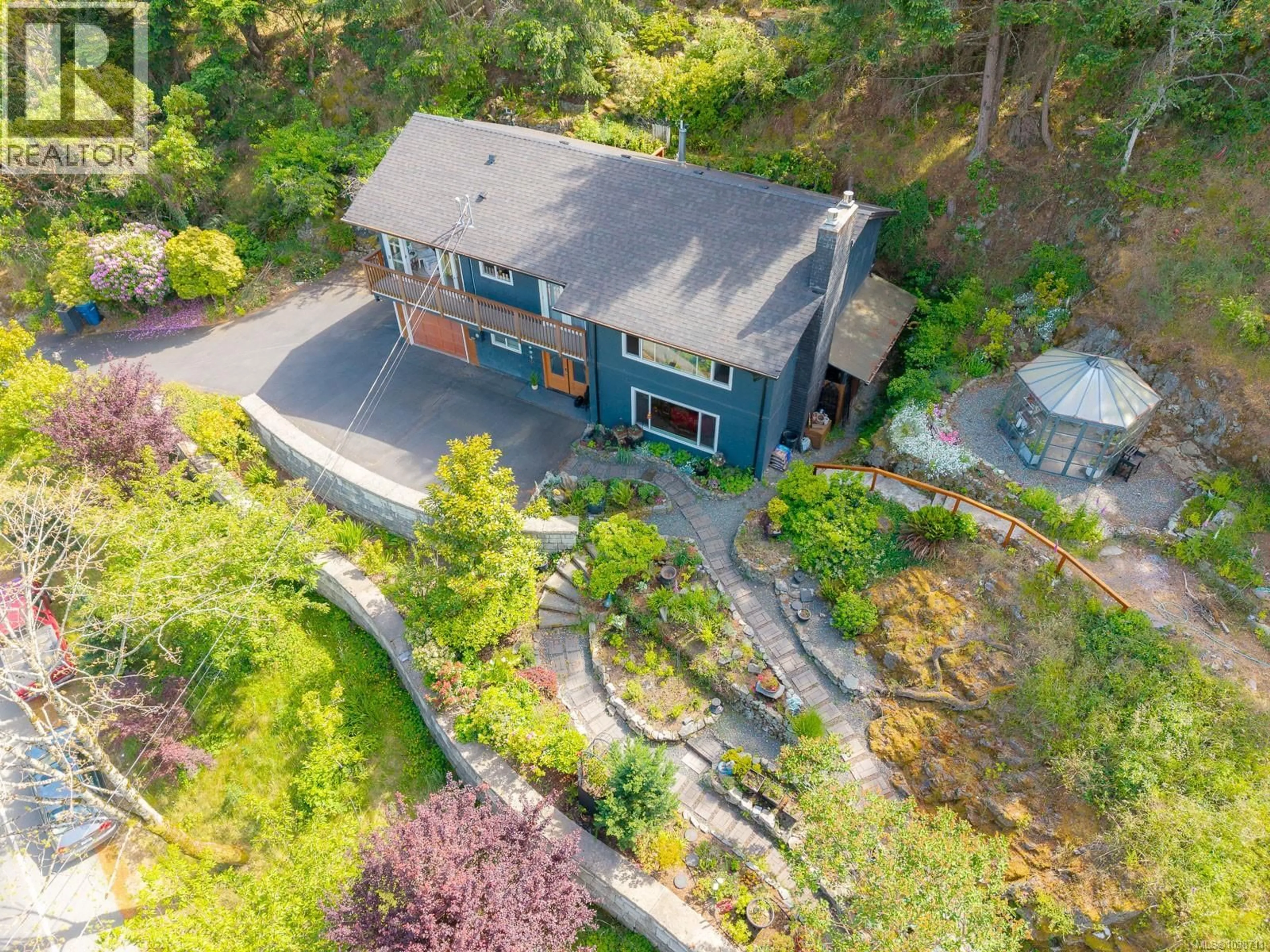 A pic from outside/outdoor area/front of a property/back of a property/a pic from drone, unknown for 3583 HAMMOND BAY ROAD, Nanaimo British Columbia V9T1E8