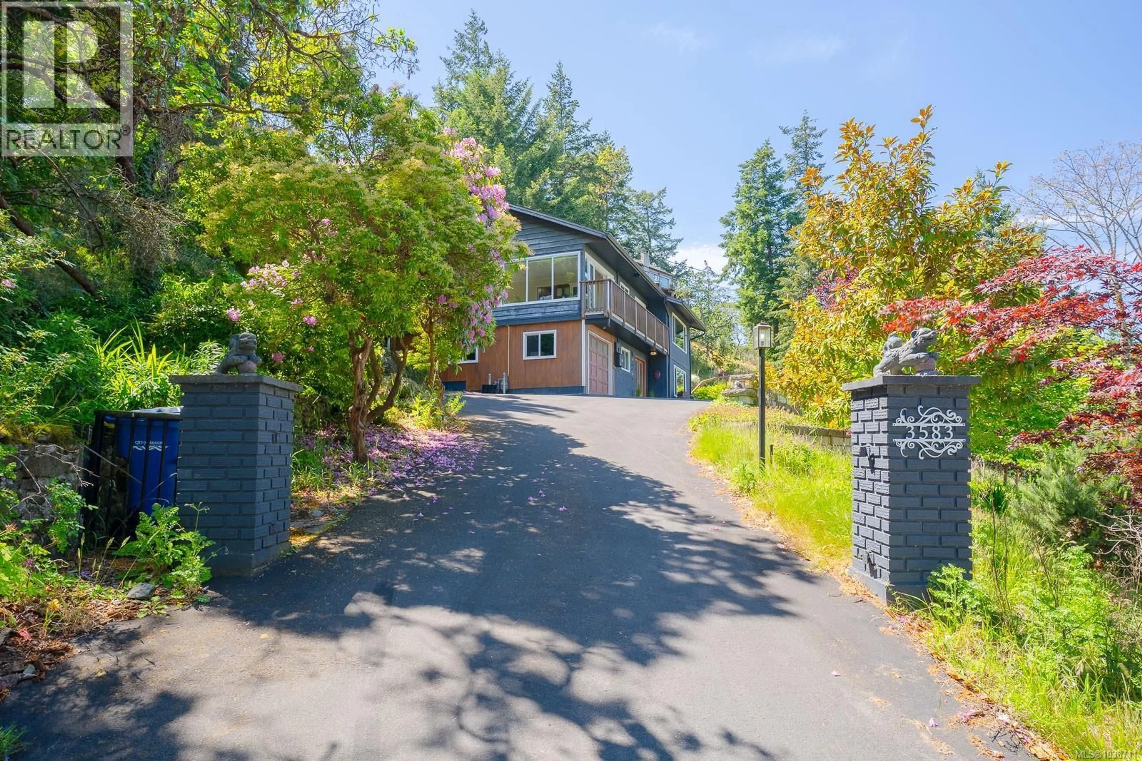 A pic from outside/outdoor area/front of a property/back of a property/a pic from drone, street for 3583 HAMMOND BAY ROAD, Nanaimo British Columbia V9T1E8