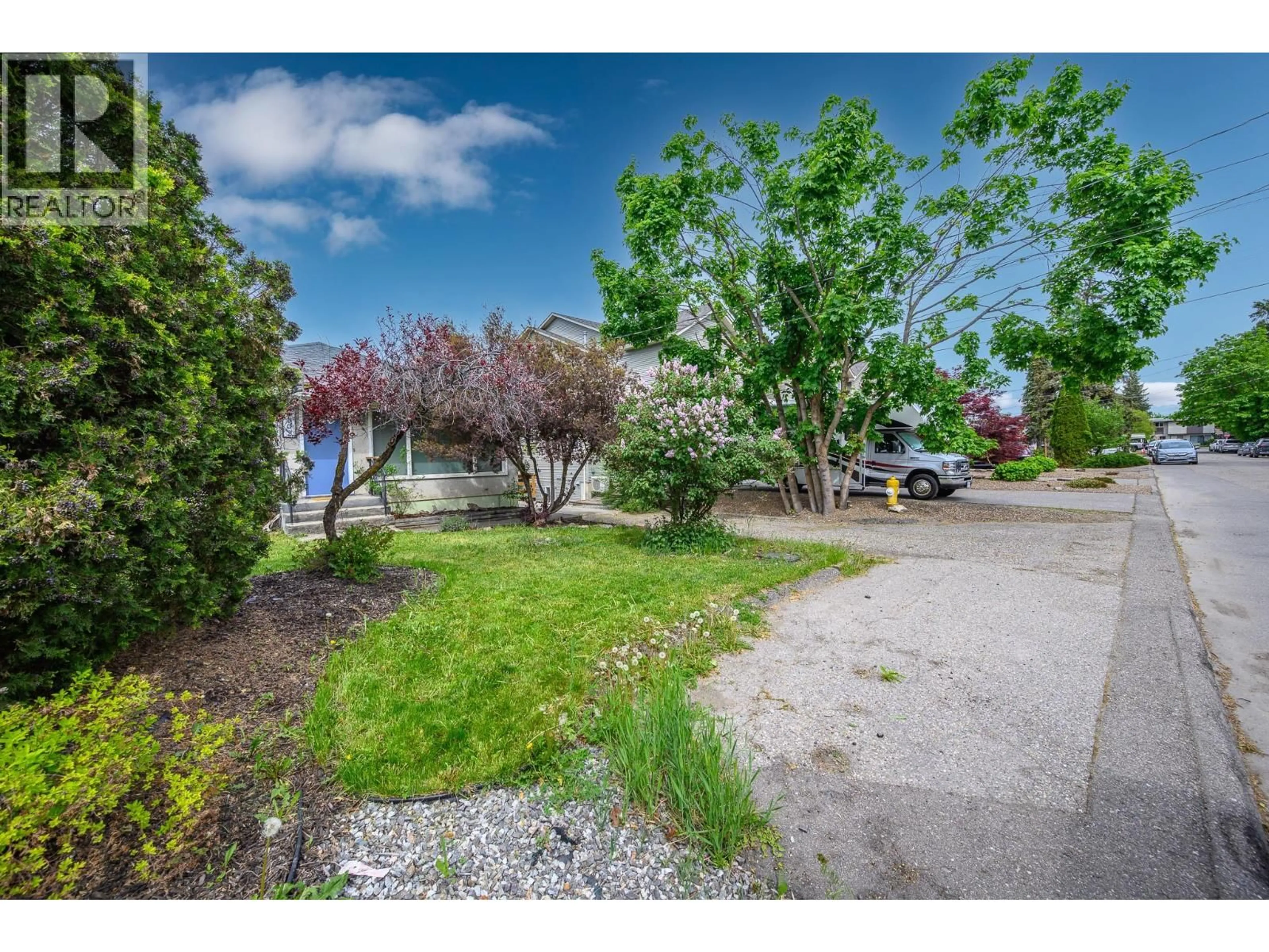 A pic from outside/outdoor area/front of a property/back of a property/a pic from drone, street for 3302 24 STREET, Vernon British Columbia V1T4N6