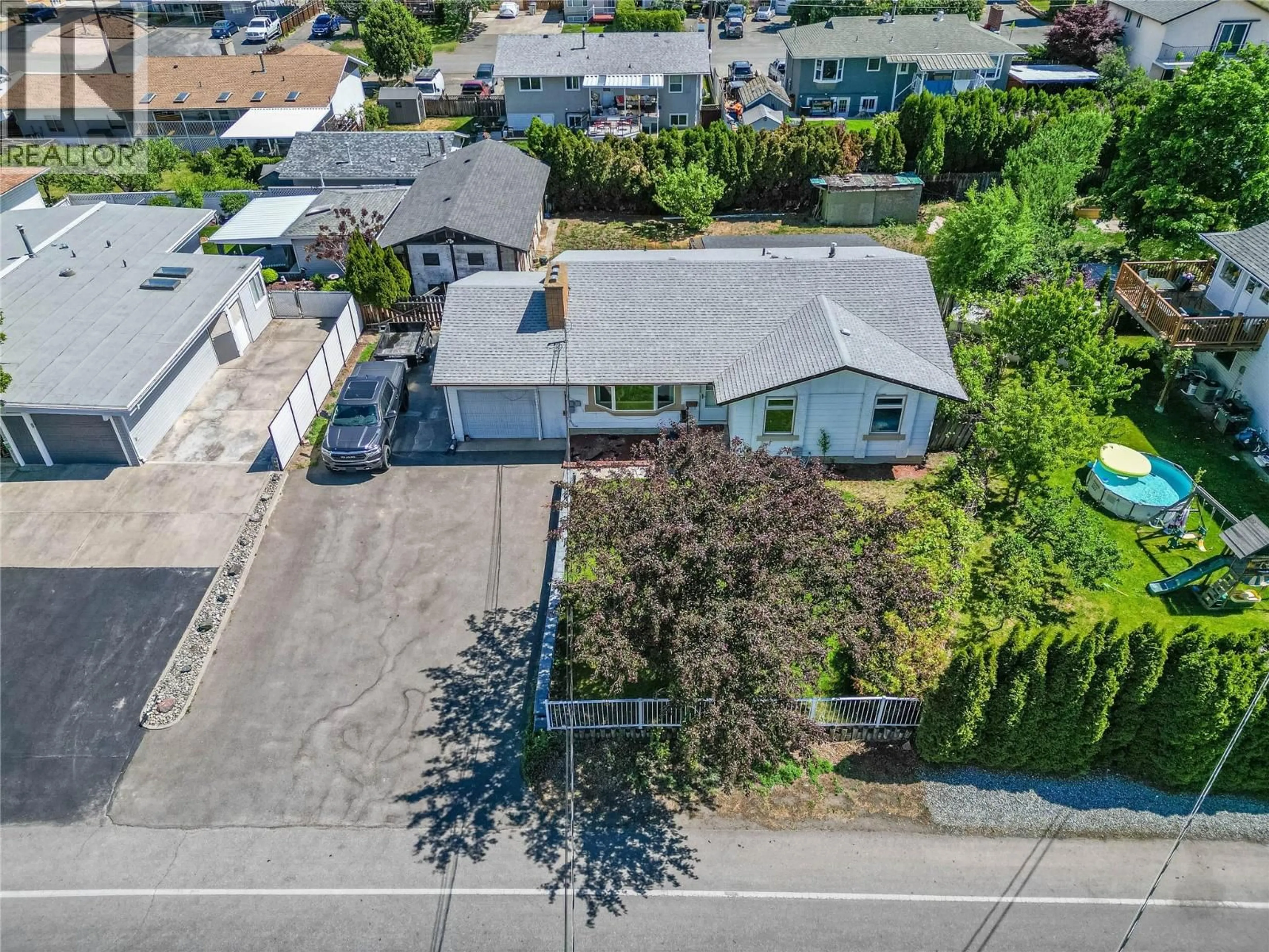 A pic from outside/outdoor area/front of a property/back of a property/a pic from drone, street for 1007 NICOLANI DRIVE, Kamloops British Columbia V2B5B4