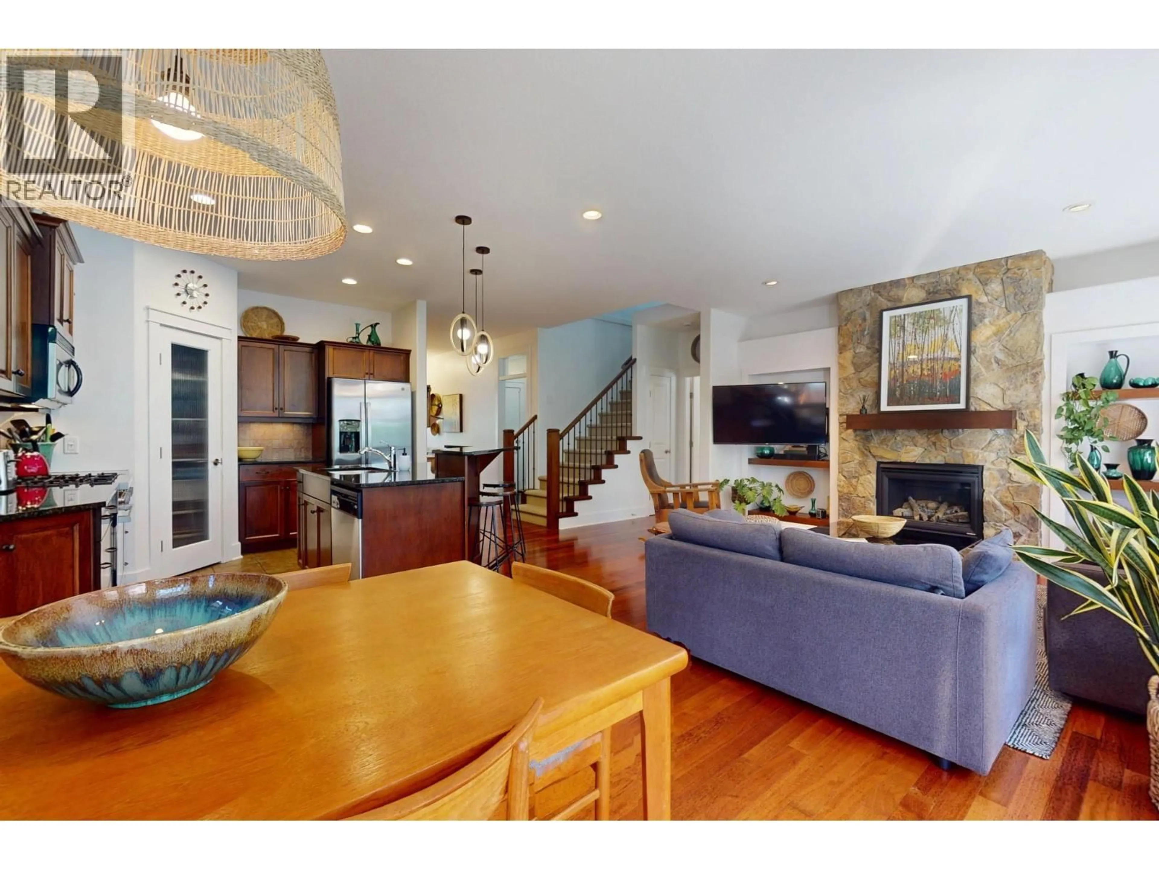 Open concept kitchen, wood/laminate floor for 32 - 670 LEQUIME ROAD, Kelowna British Columbia V1W1A4